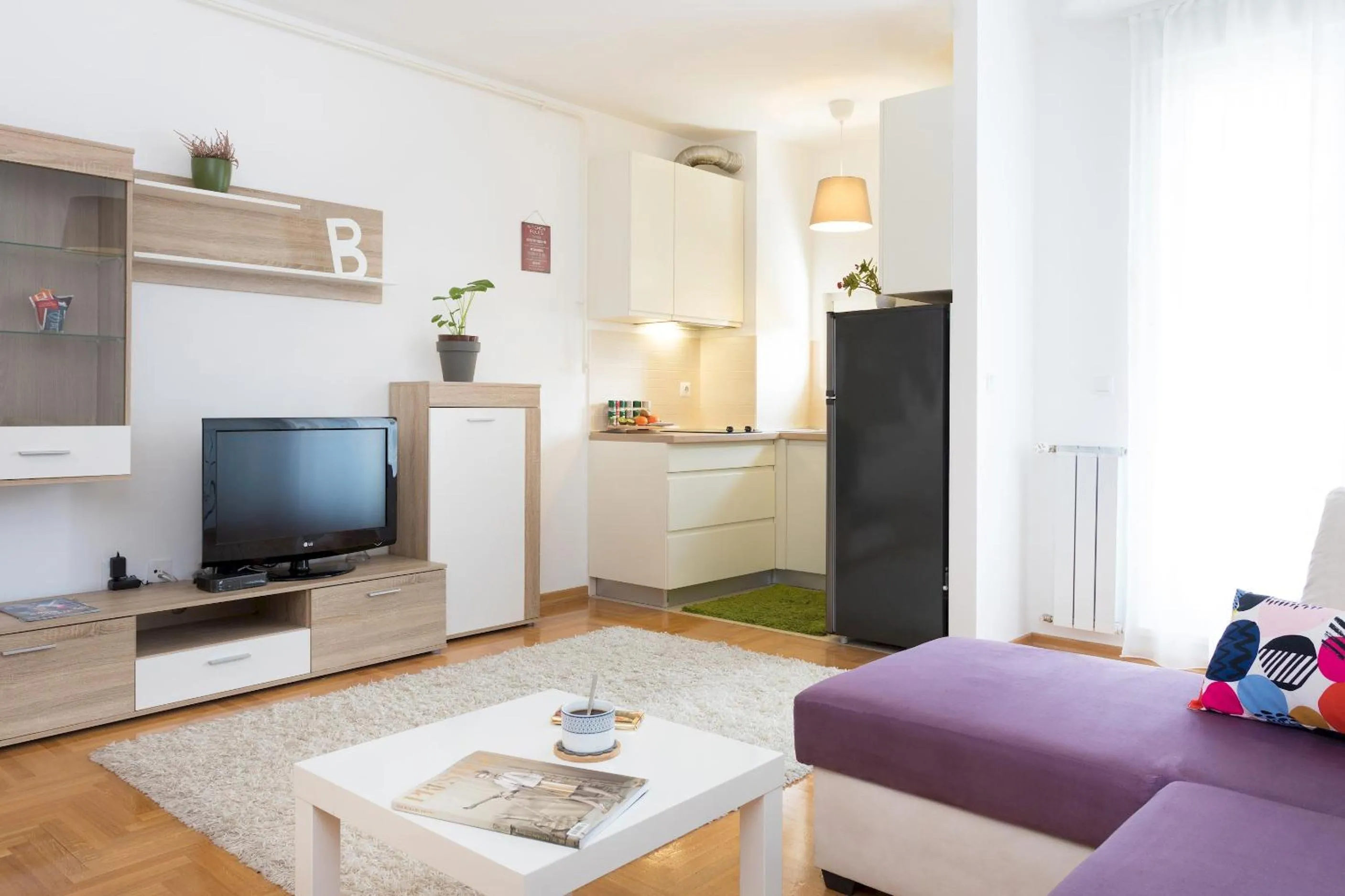 Living room in Cute and Sunny Studio in Zagreb with Balcony & Free Parking