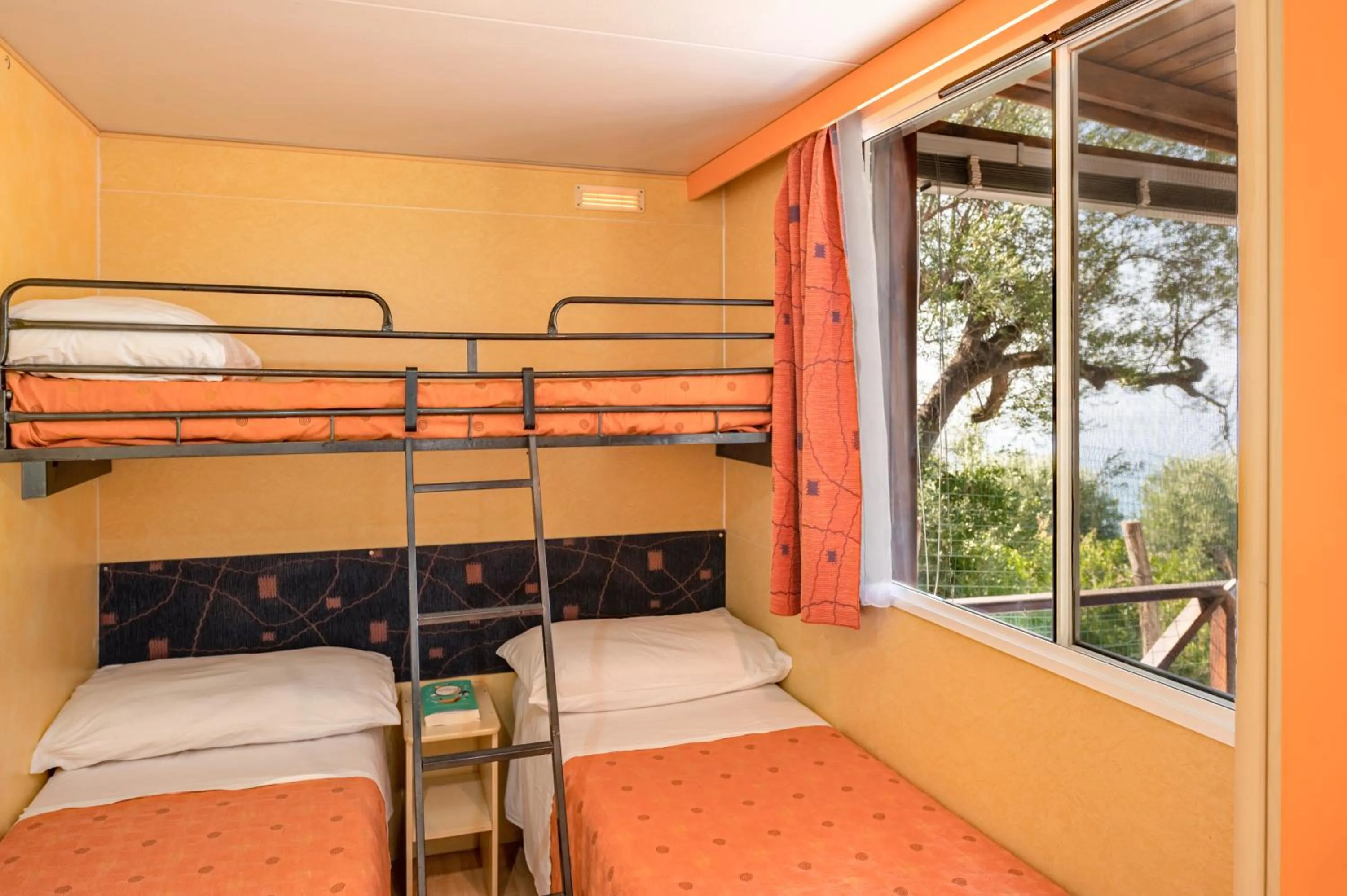 Patio, Bed in Resort Baia del Silenzio