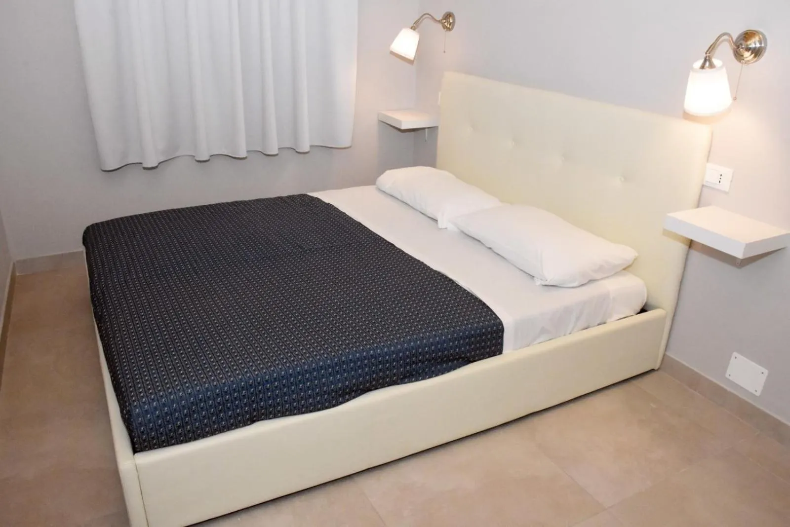 Photo of the whole room, Bed in Resort Baia del Silenzio