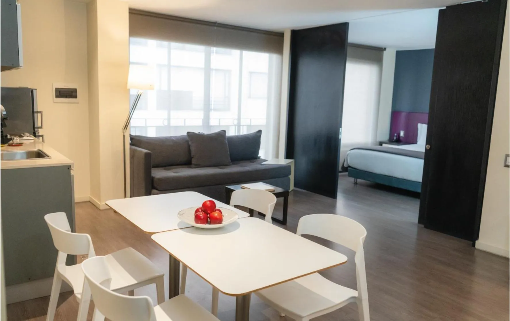 Living room, Bed in Central Apartamentos Bogotá