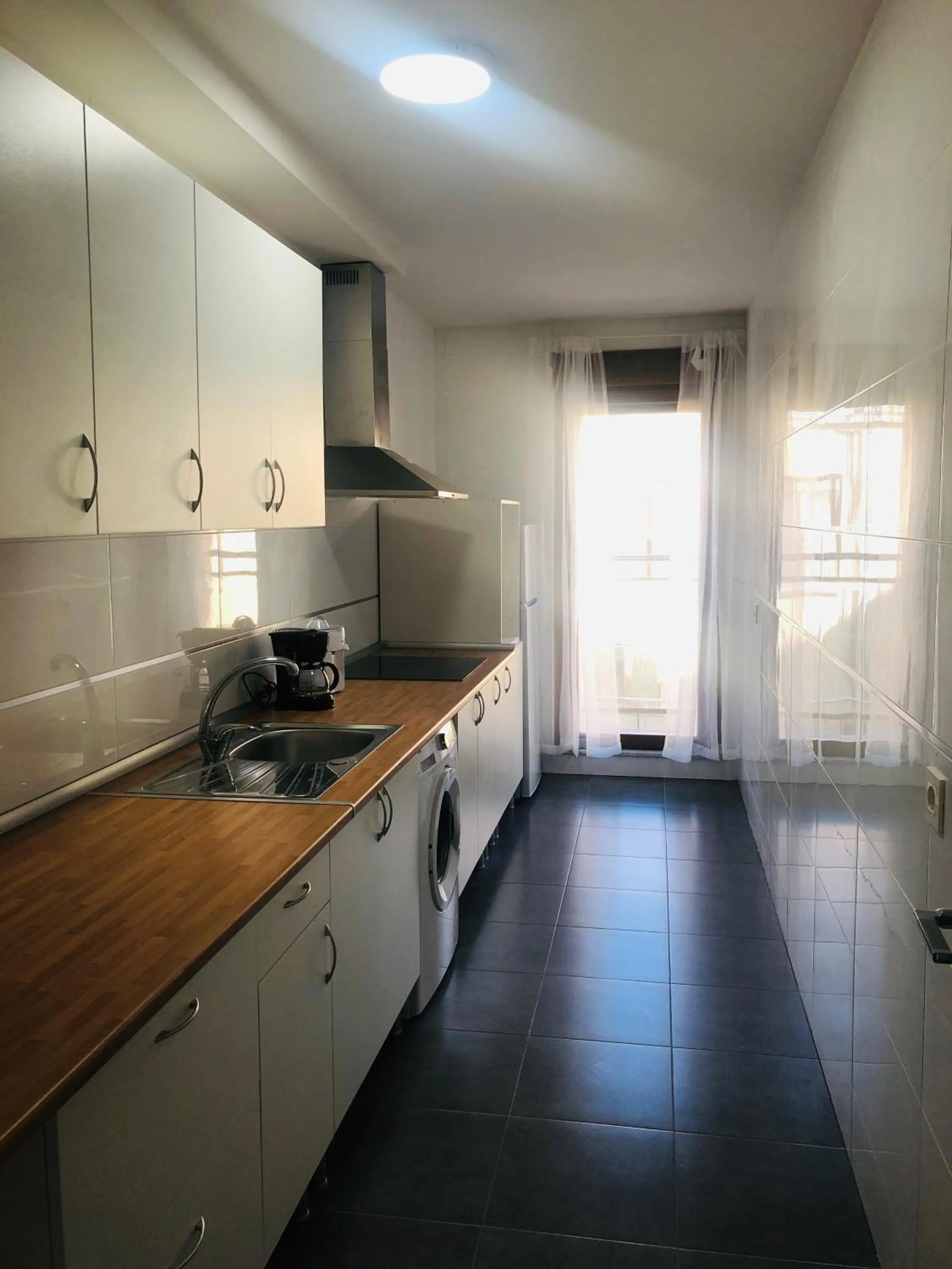 Kitchen or kitchenette in Apartamento Puente Romano Portal 4 1-B