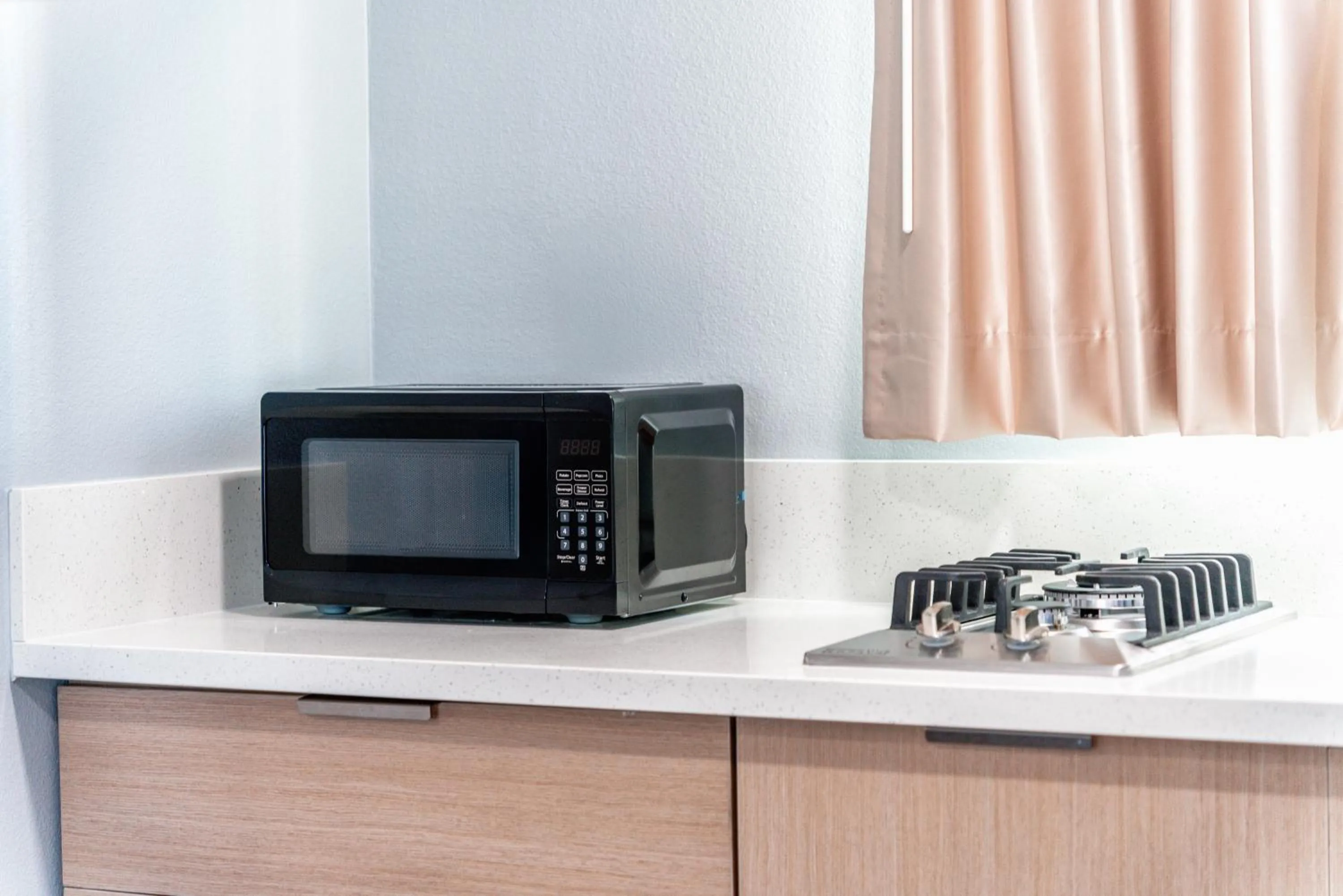 Kitchen or kitchenette in Pacific Inn and Suites