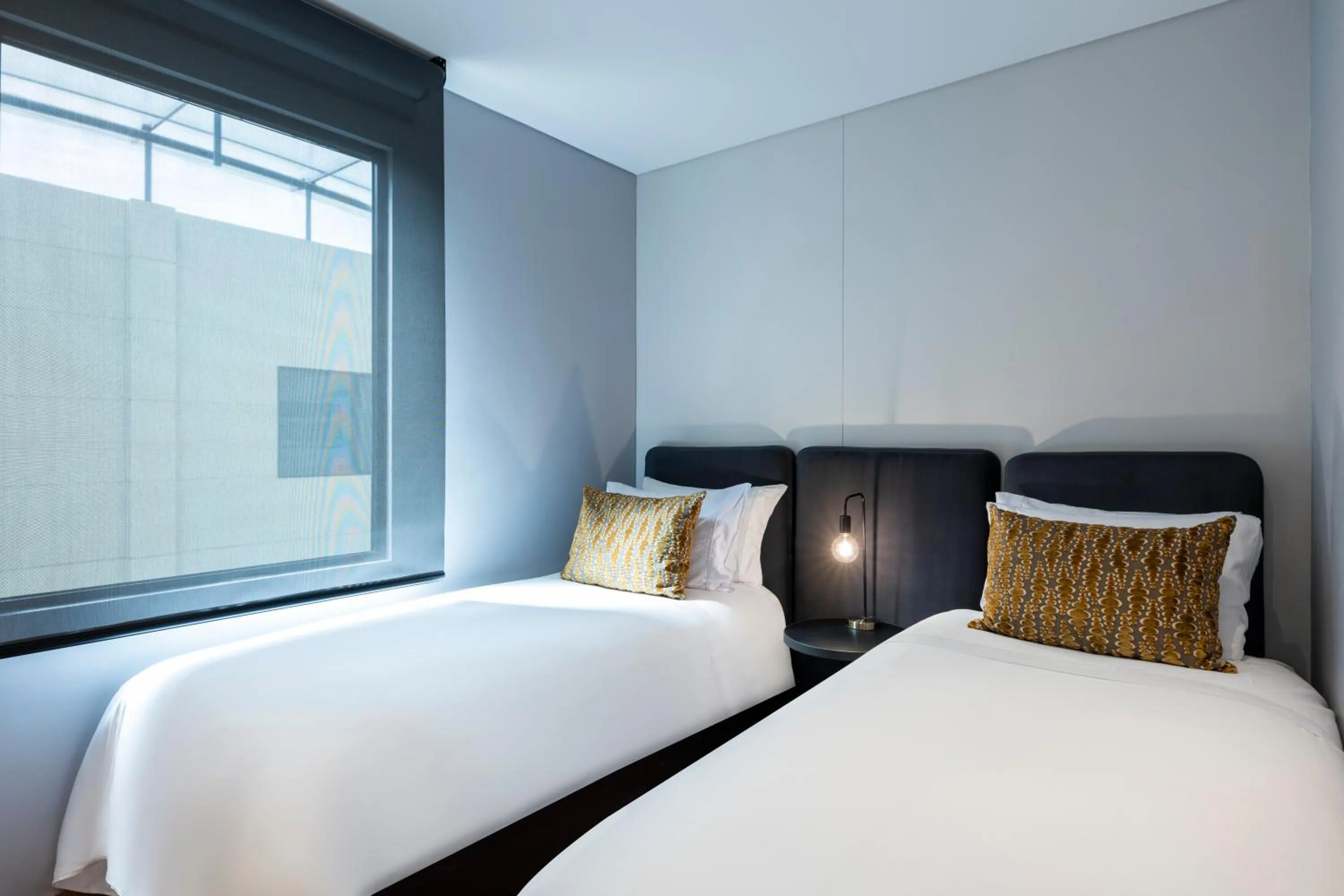 Bed in Hotel 93 Luxury Suites by Preferred