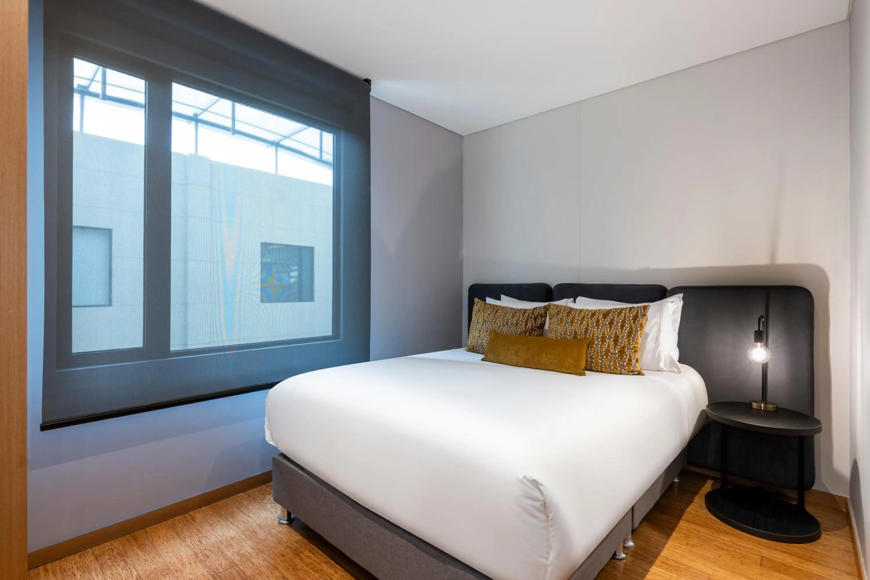 Bed in Hotel 93 Luxury Suites by Preferred