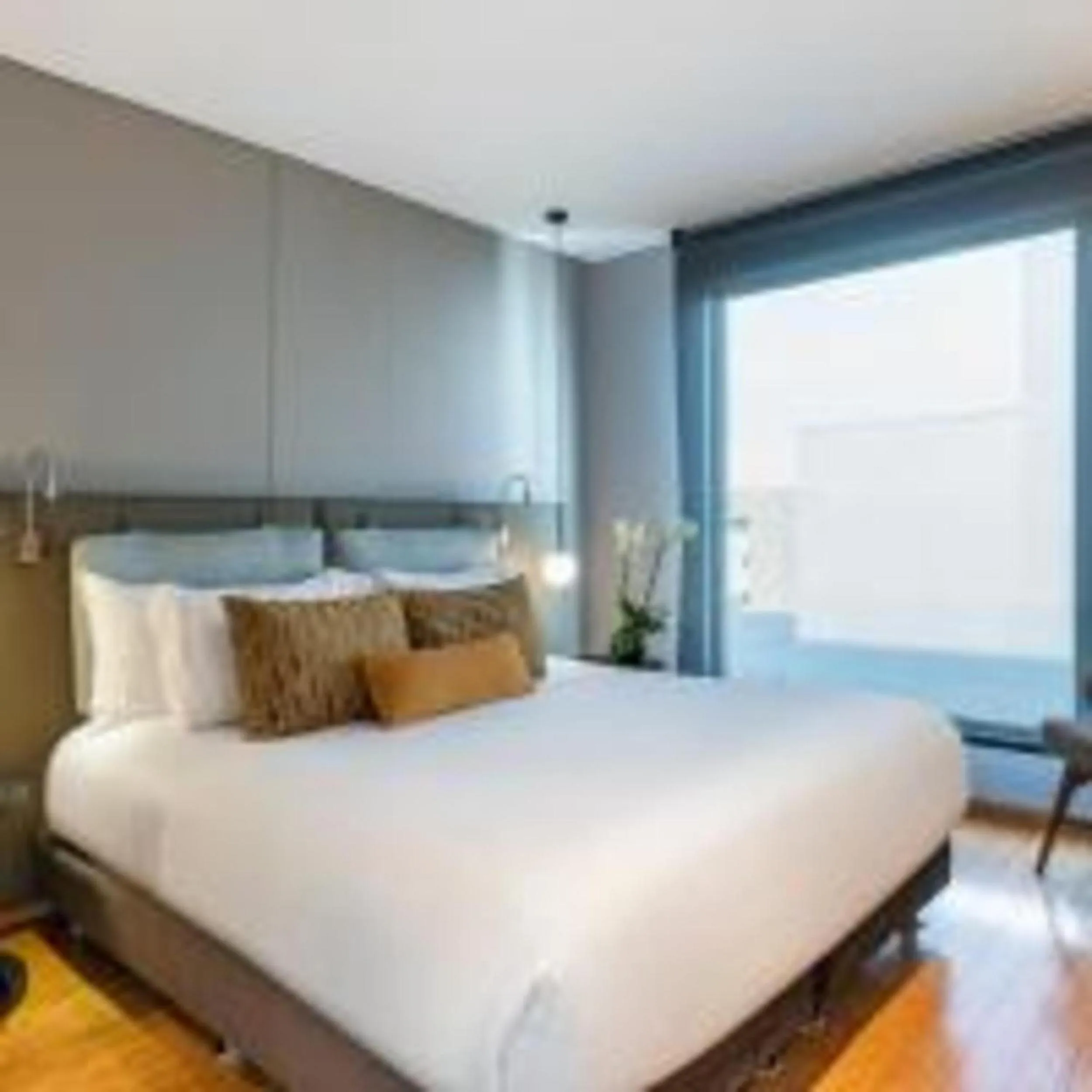Bed in Hotel 93 Luxury Suites by Preferred