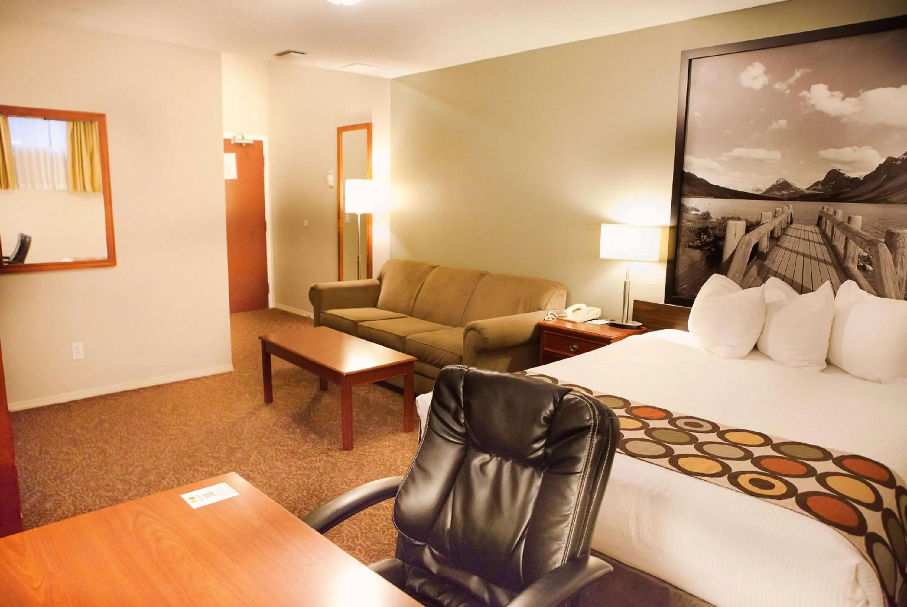 Bed in Super 8 by Wyndham Cochrane