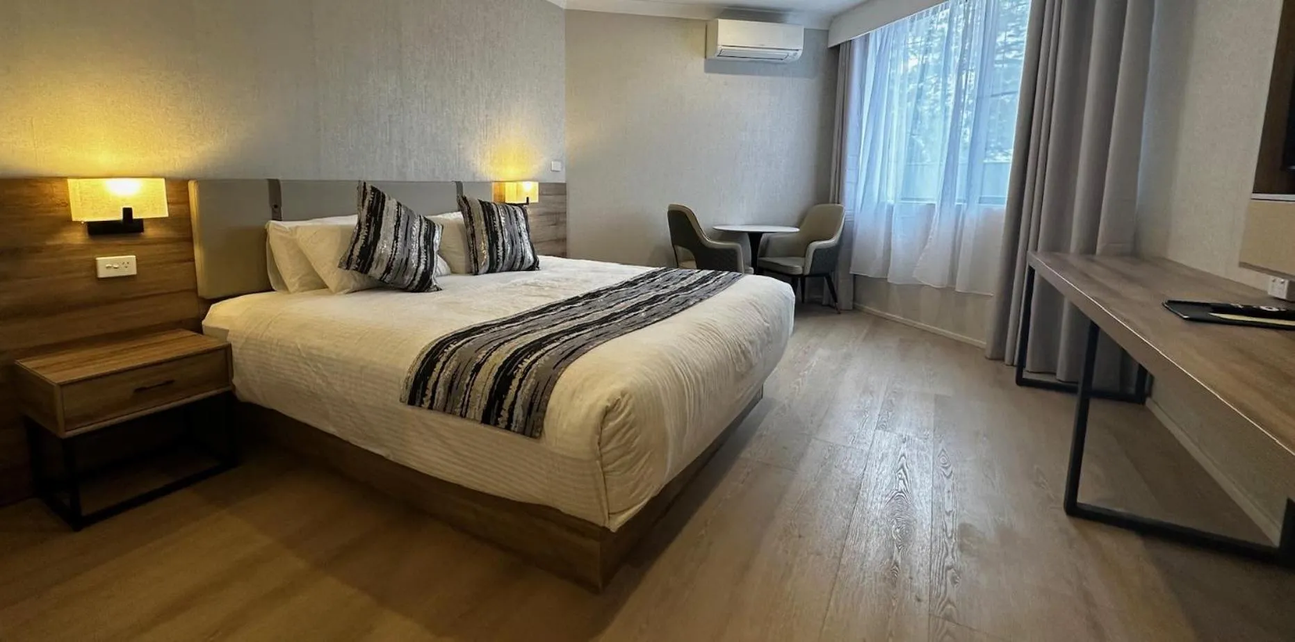 Bed in Charbonnier Motor Inn