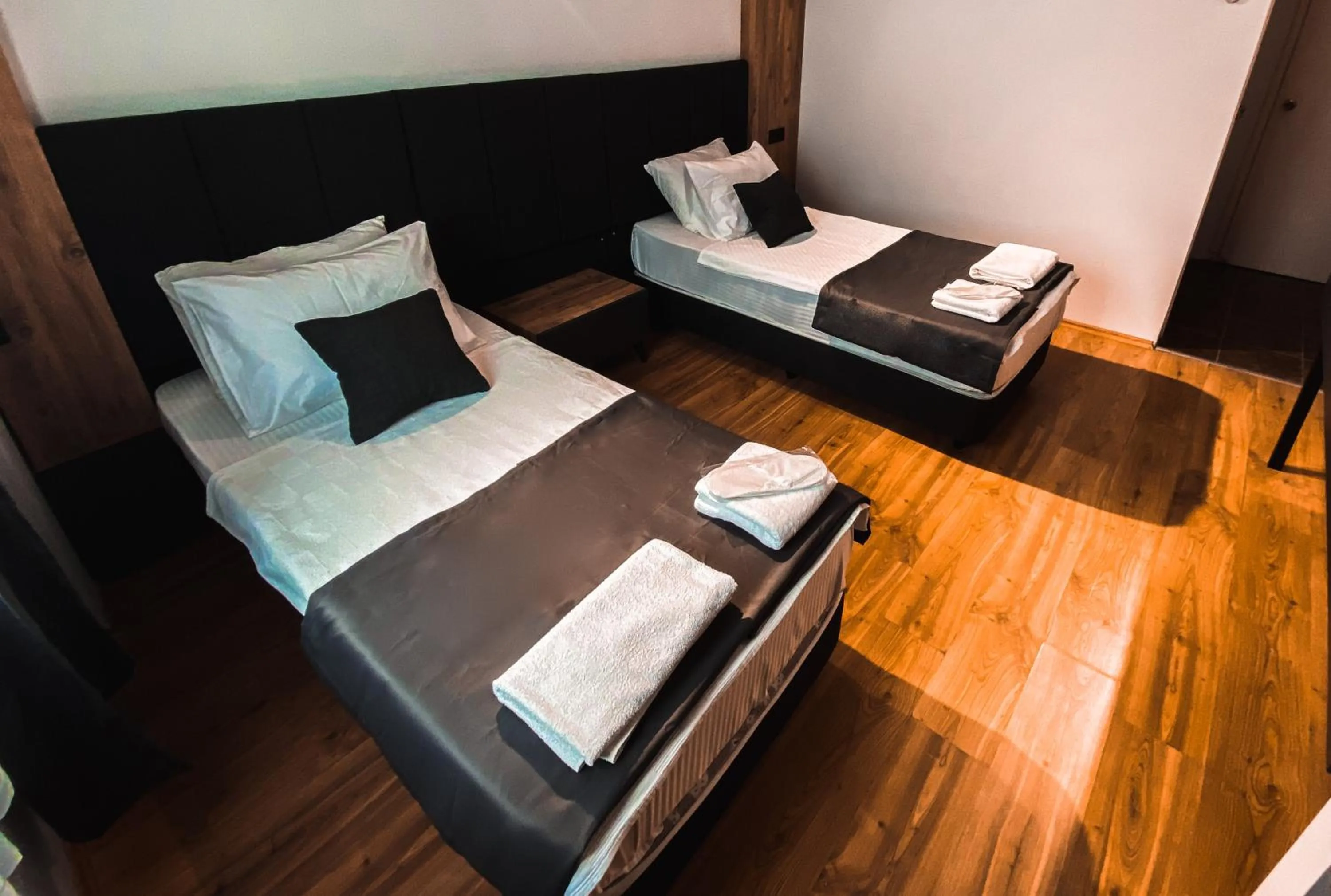 Bed in TEPE HOTEL&BUSINESS SUITE