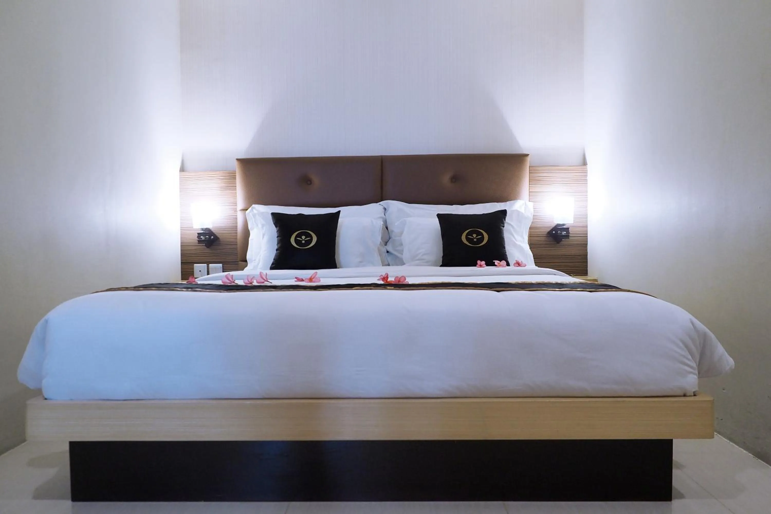 Bed in Nagoya Mansion Hotel and Residence