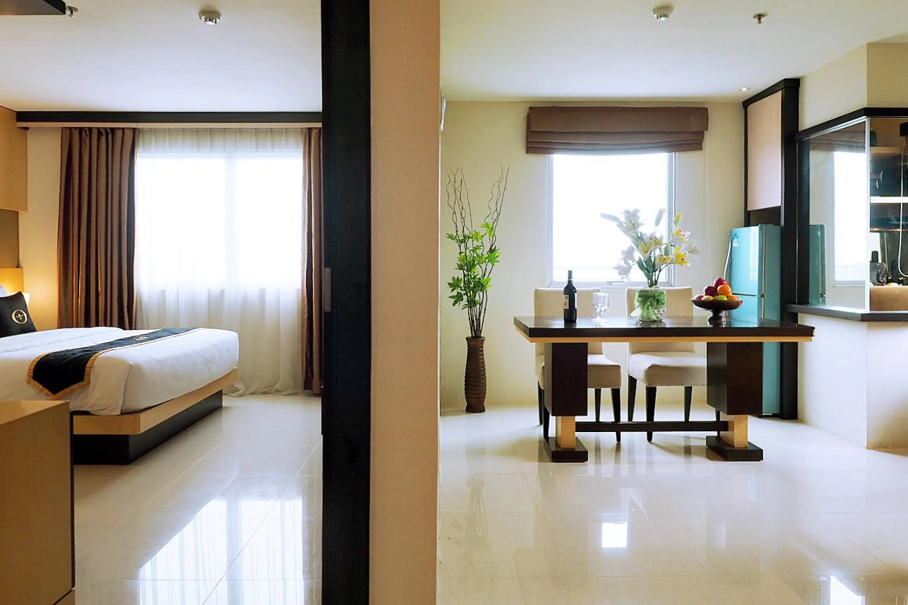 Living room, Bed in Nagoya Mansion Hotel and Residence