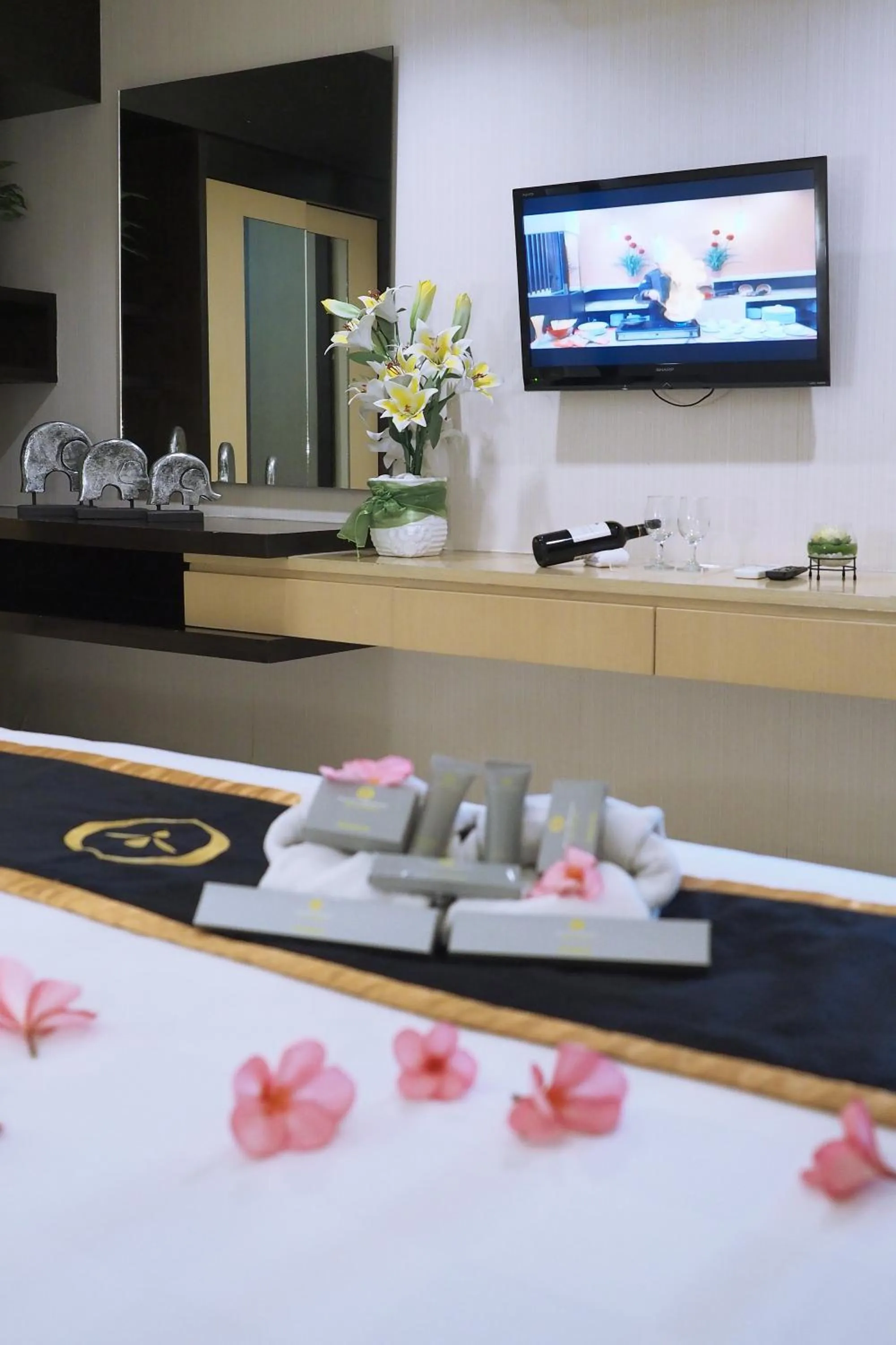 Bed in Nagoya Mansion Hotel and Residence