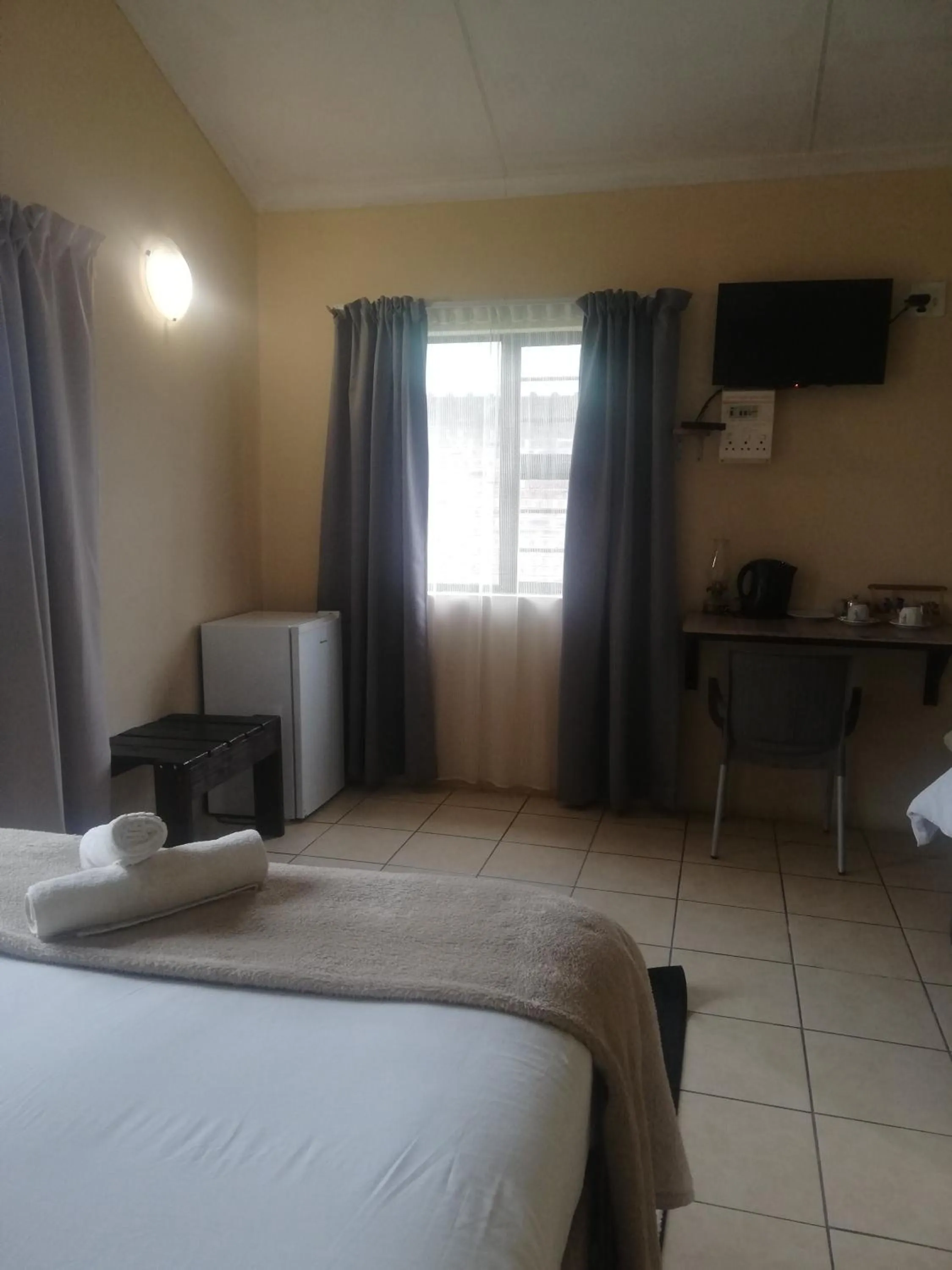 Communal lounge/ TV room in The Old Mill Hotel