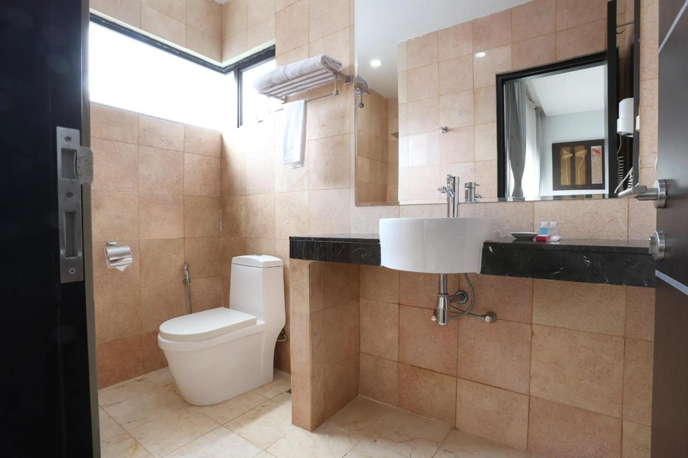 Bathroom in The Centro Hotel & Residence By Orchardz