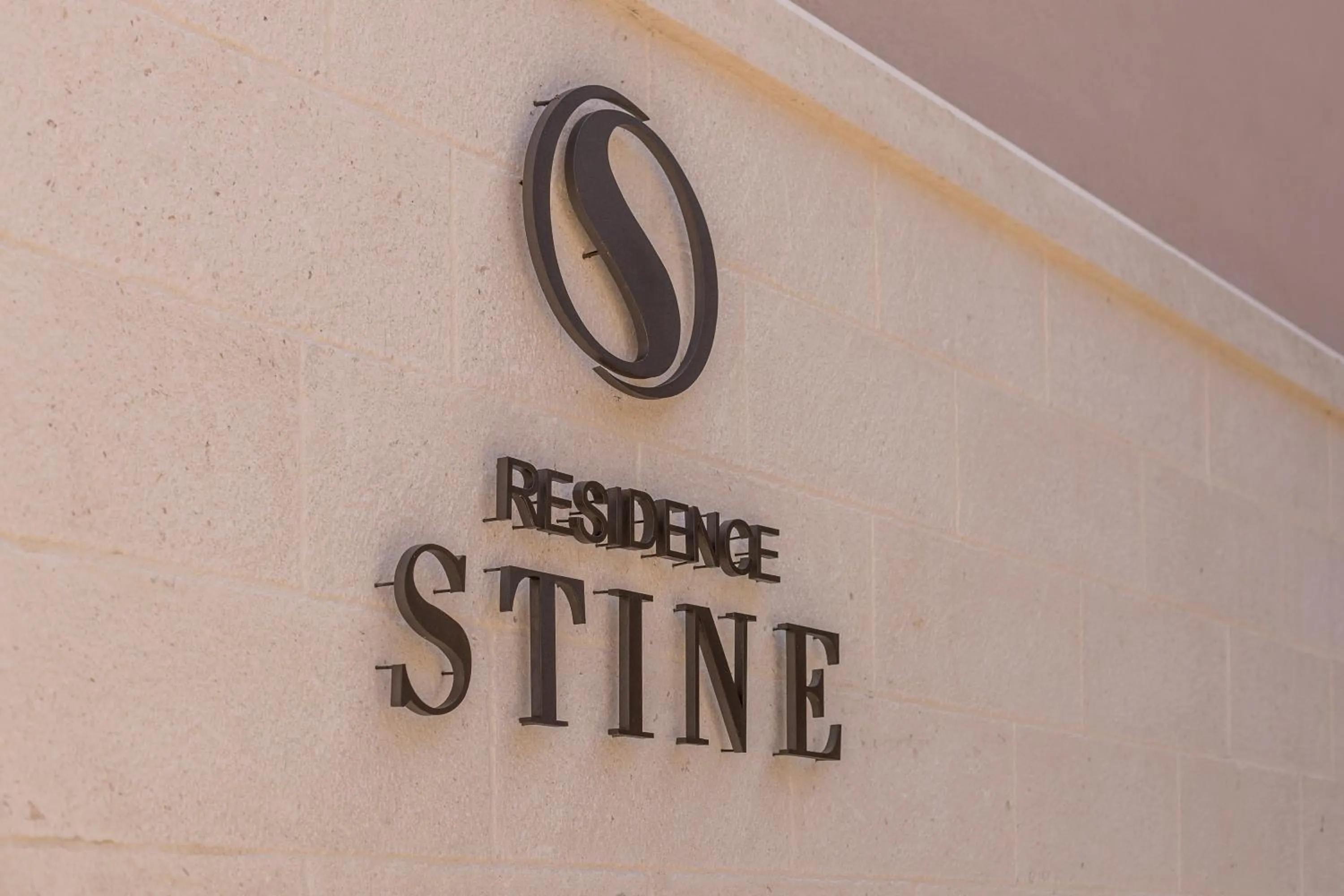 Property logo or sign in Residence Stine