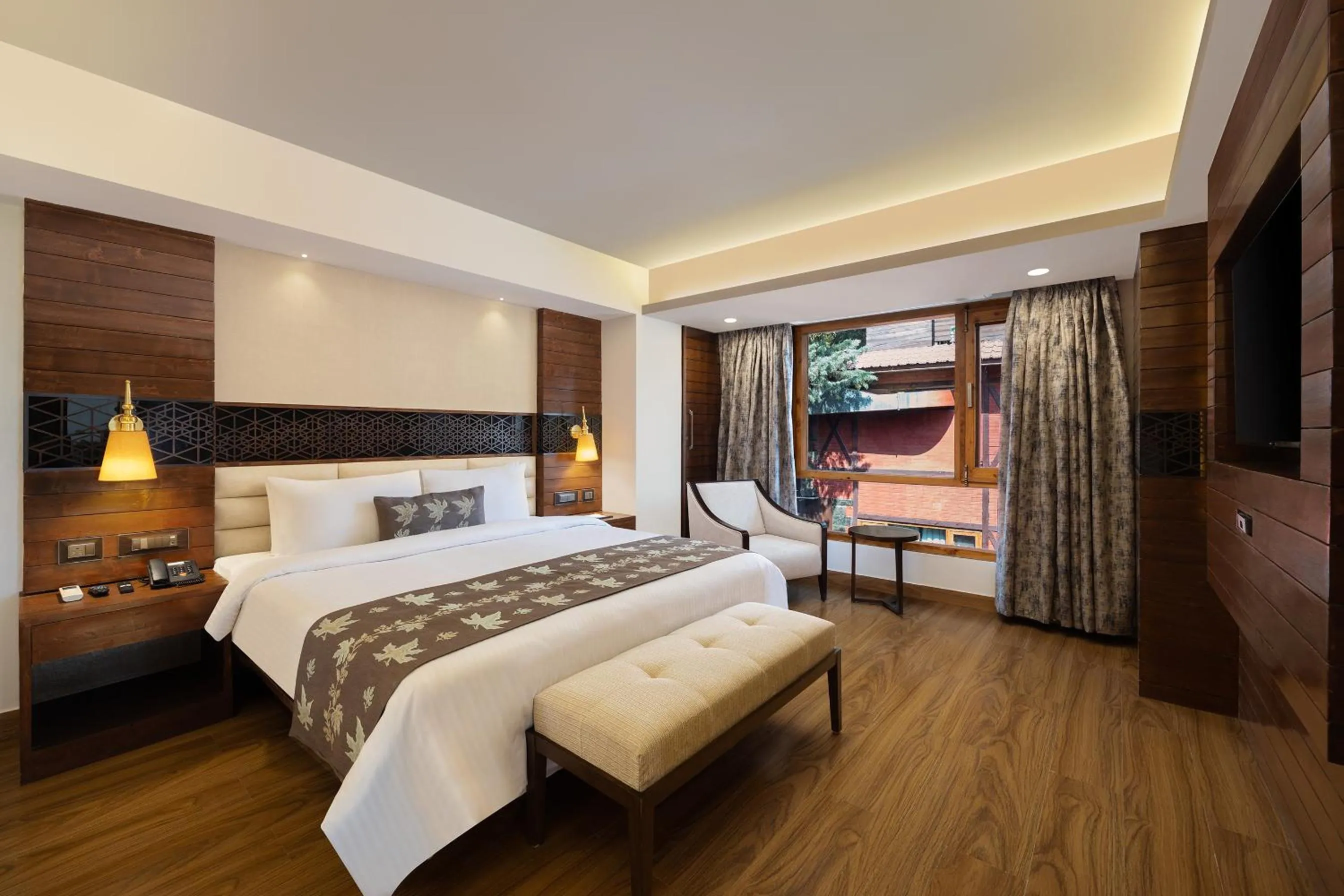 Bed in Golden Tulip Srinagar