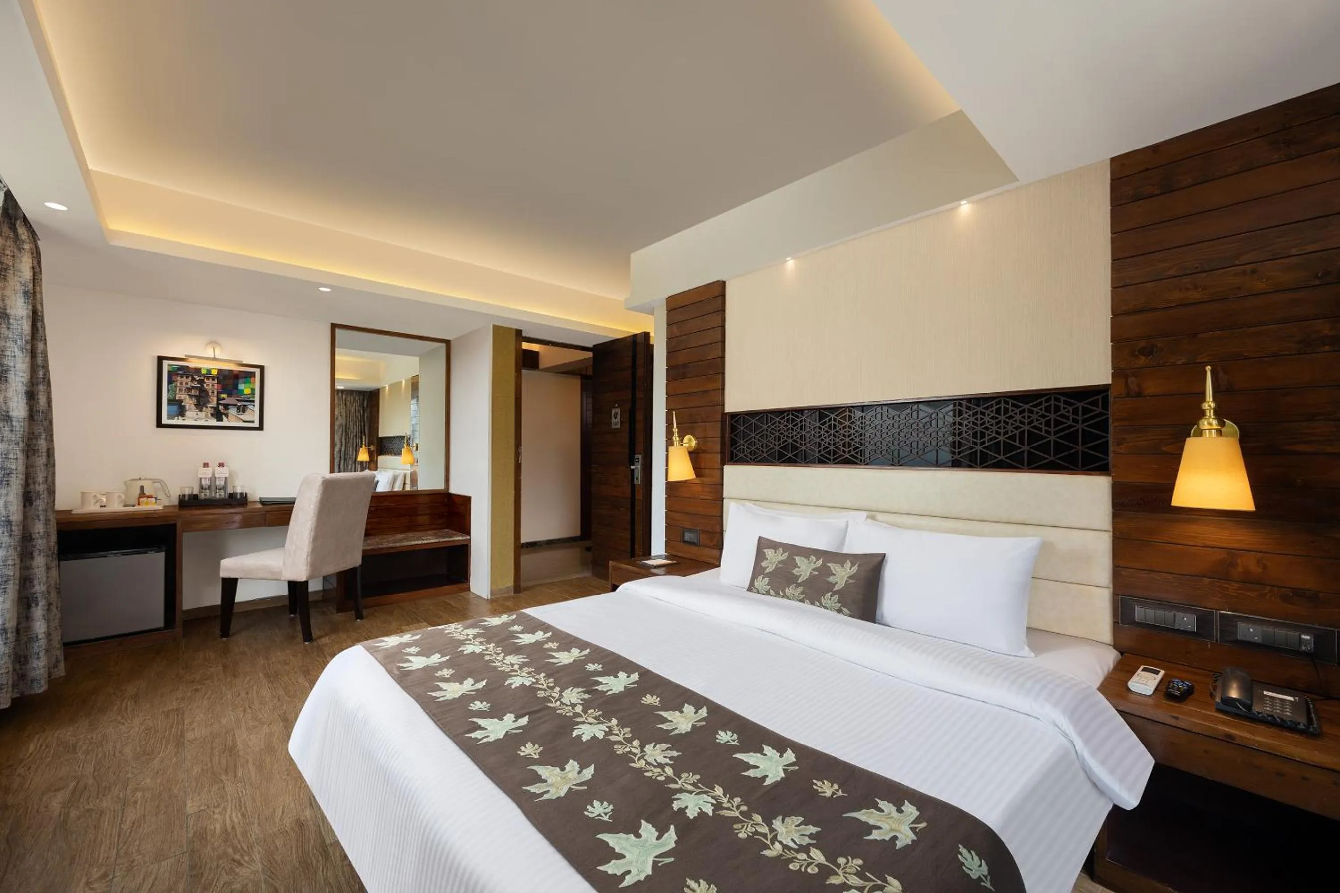 Bed in Golden Tulip Srinagar