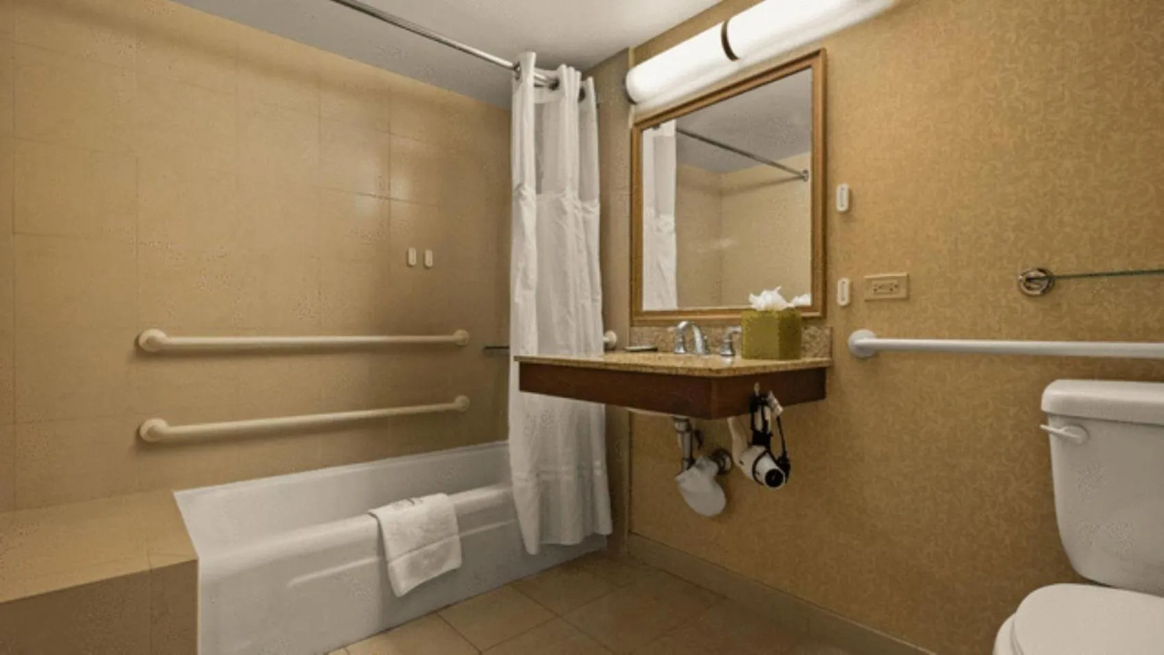 Bathroom in Airport Honolulu Hotel, Trademark Collection by Wyndham