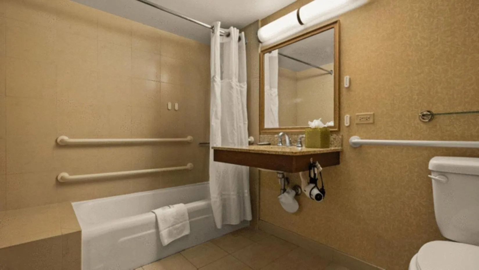 Bathroom in Airport Honolulu Hotel, Trademark Collection by Wyndham