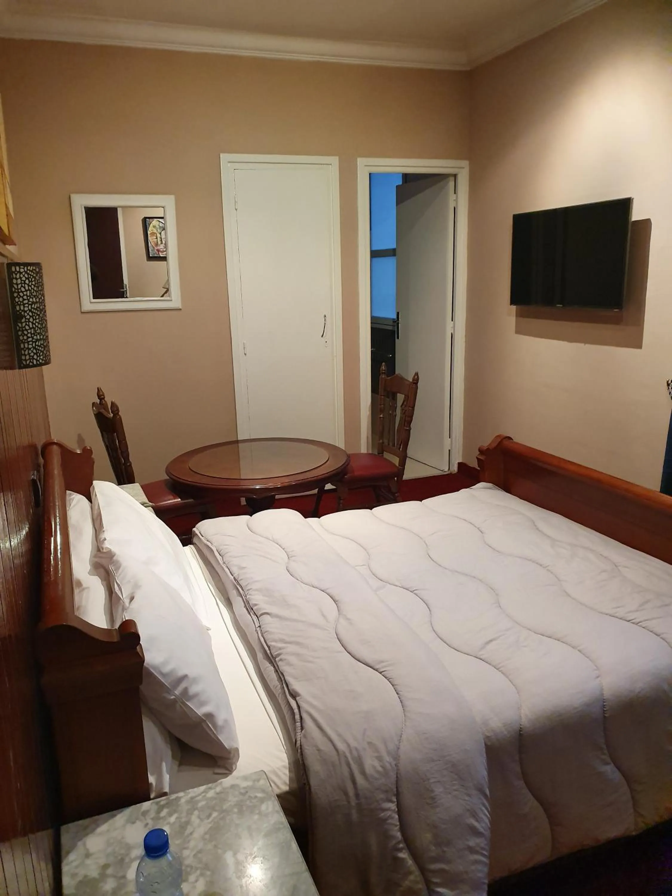 Bed in Ambassy Hotel