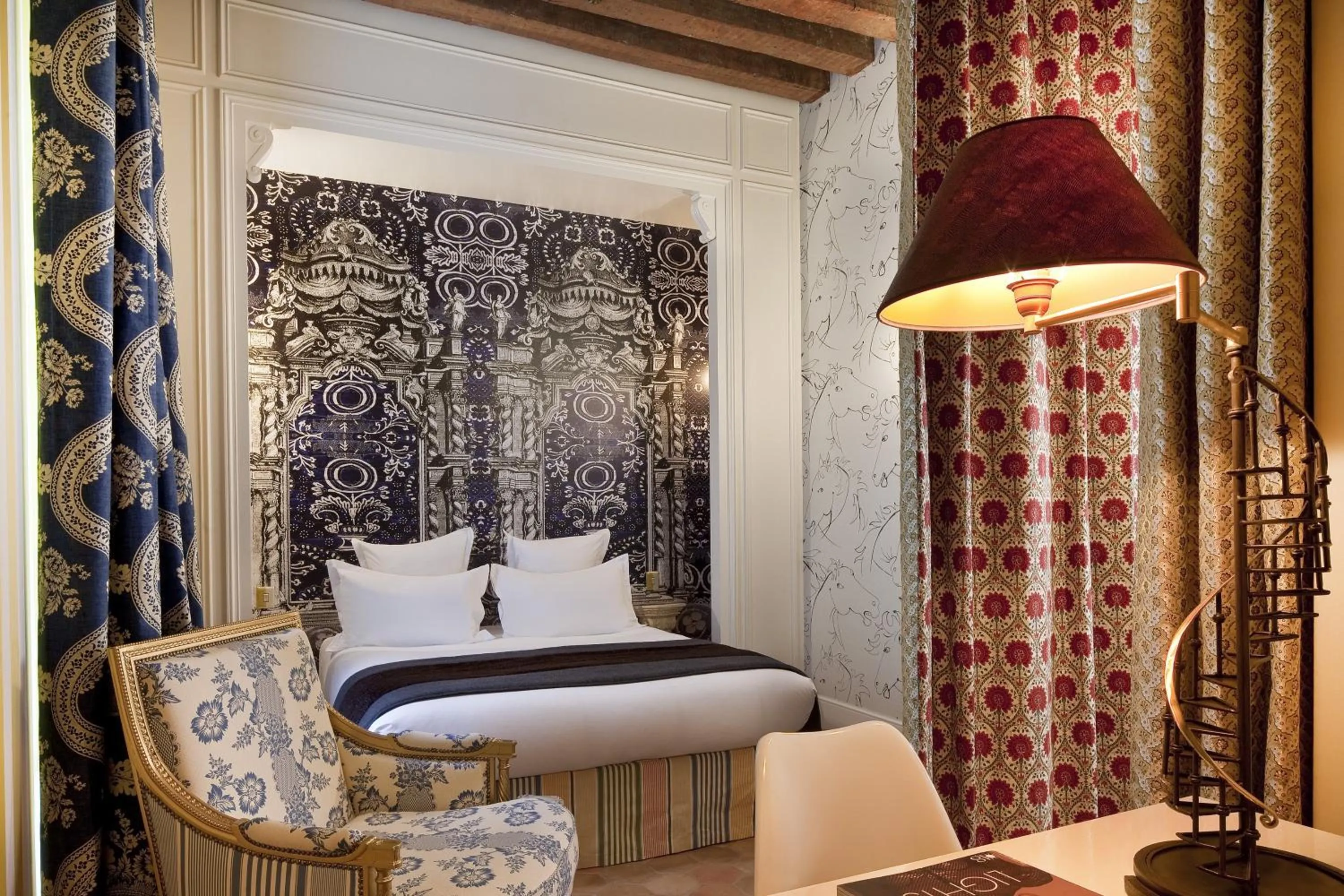 Photo of the whole room, Bed in Hôtel du Petit Moulin, Haute Couture hotel by Lacroix