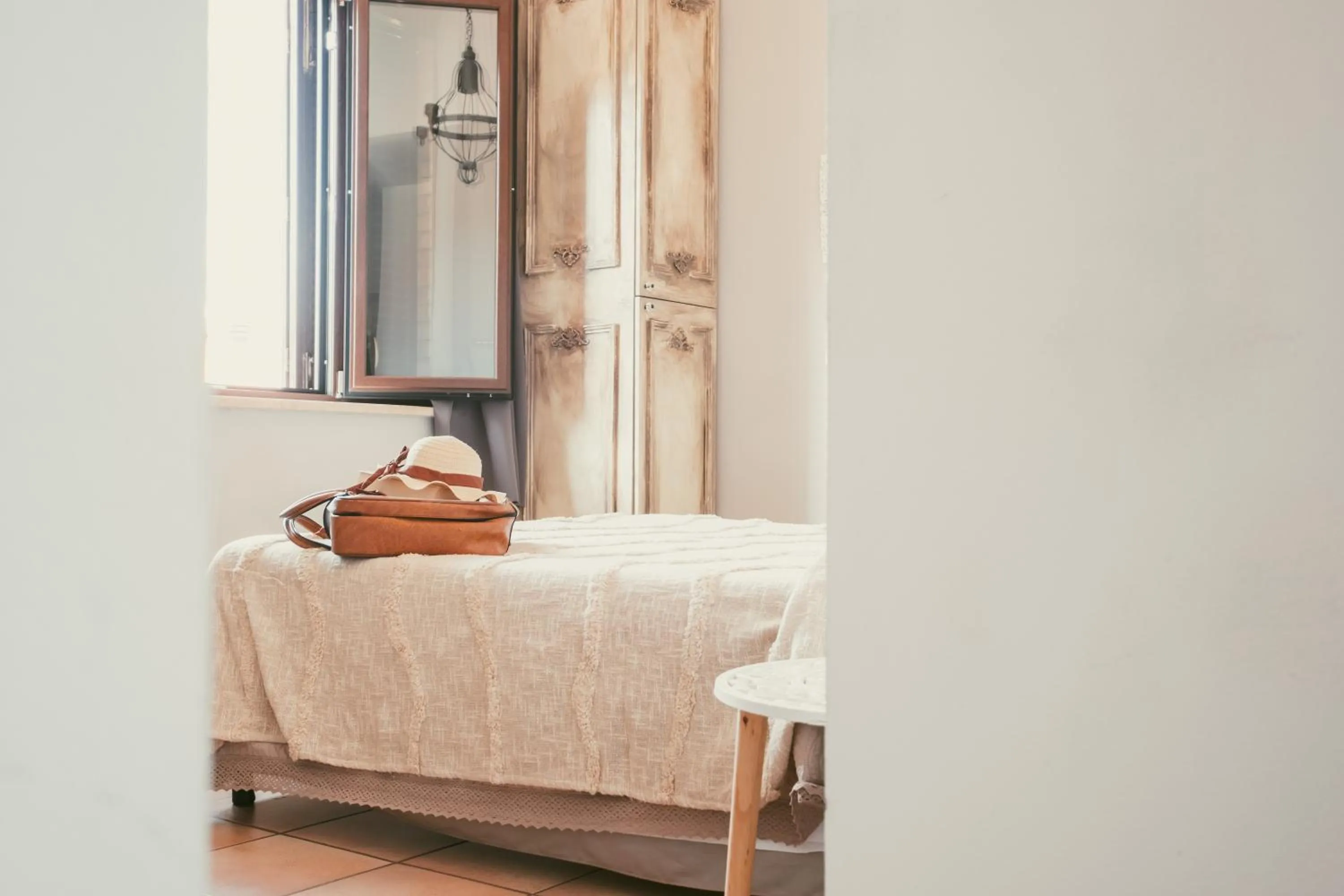 People, Bed in Palazzetto del Pittore in San Quirico d'Orcia