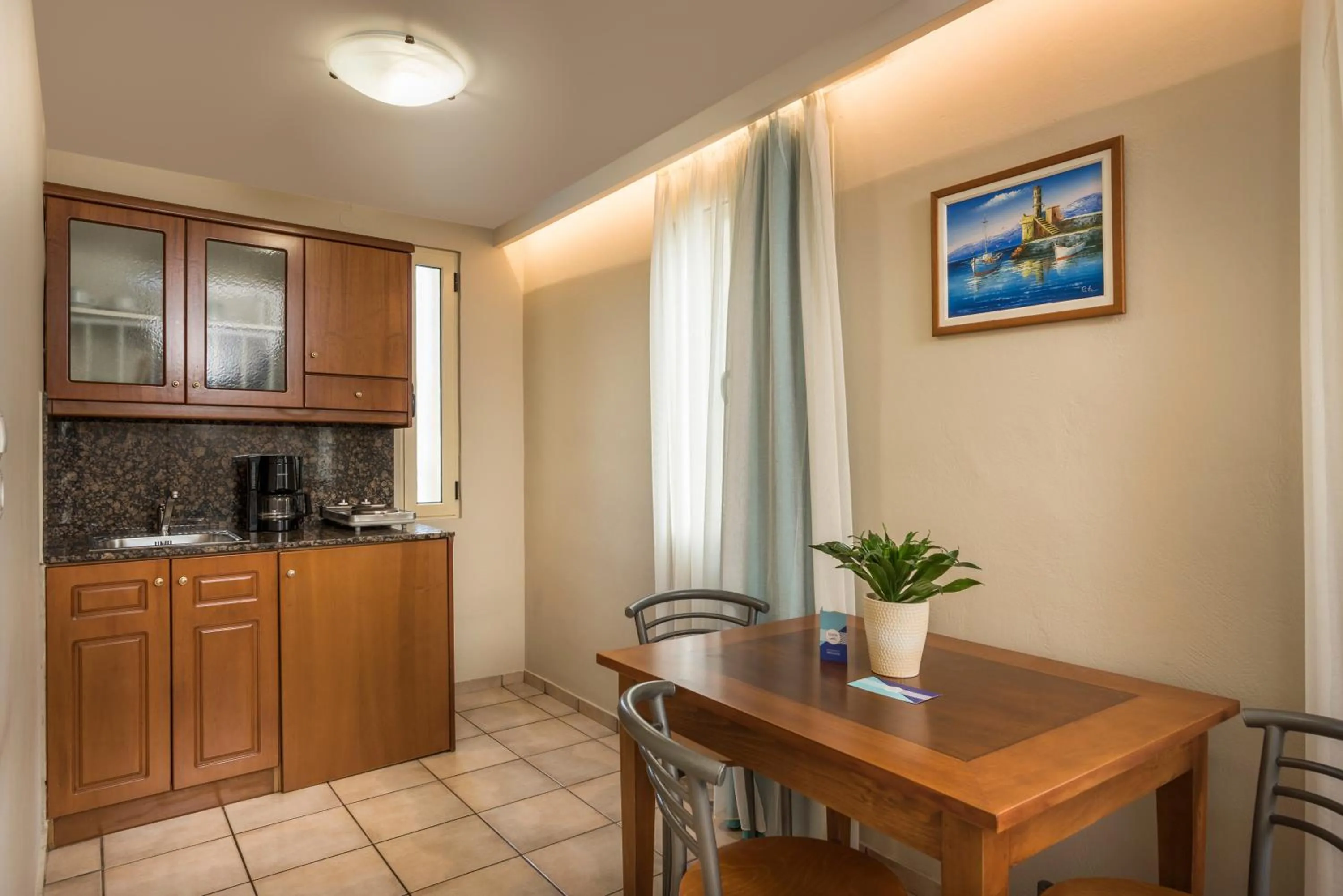 Kitchen or kitchenette in Elotis Suites
