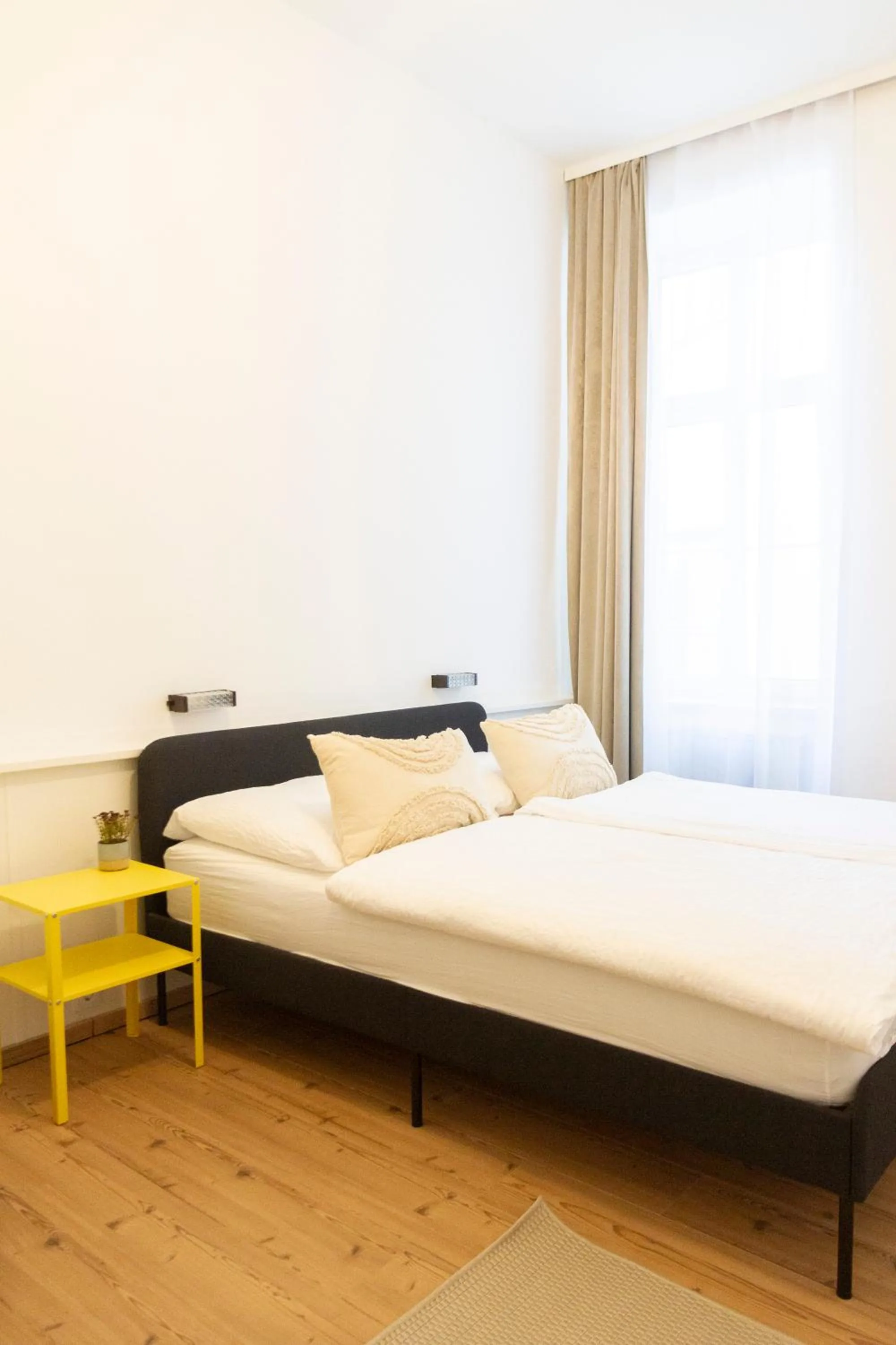 Bed in KIBI Rooms self check-in