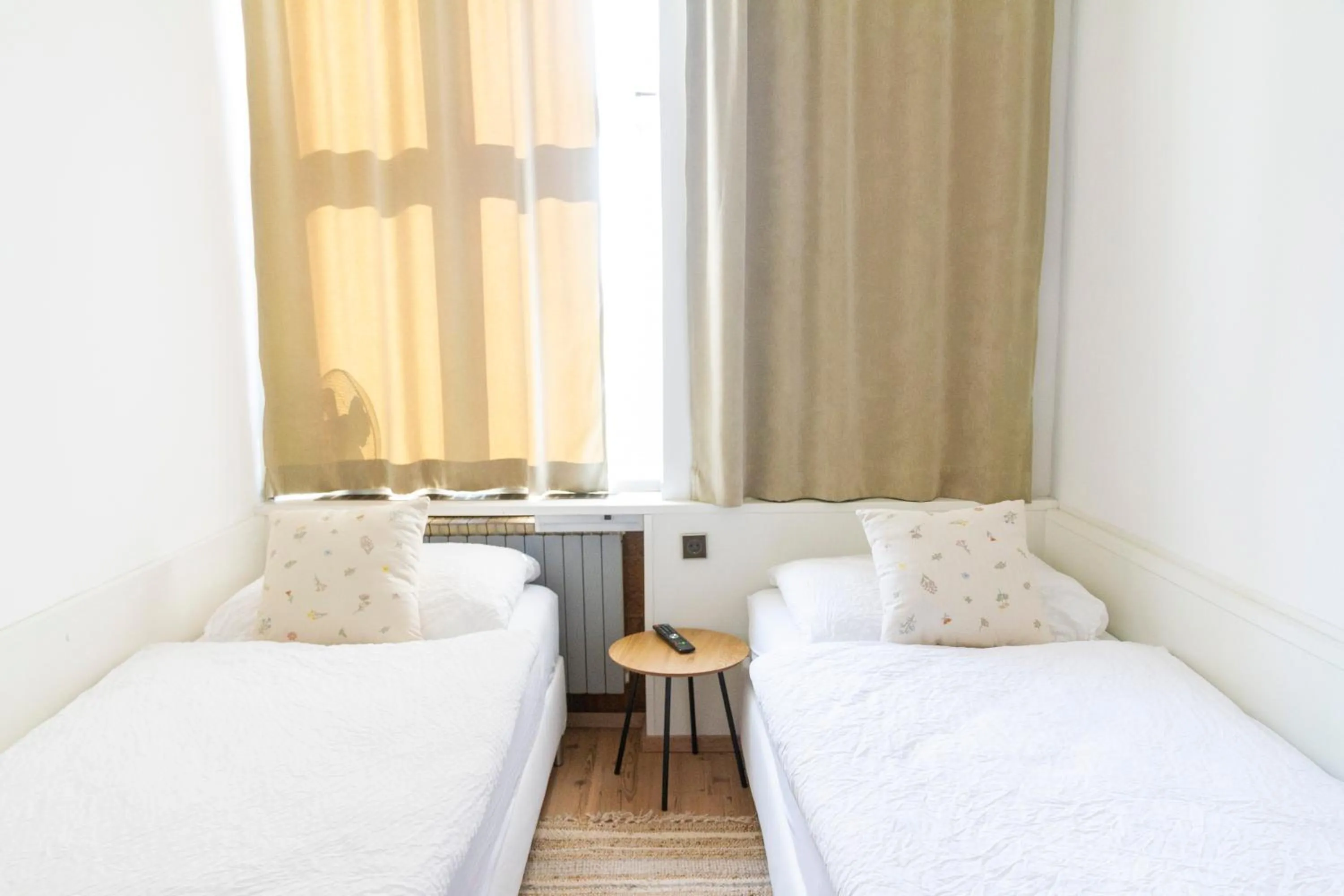 Bed in KIBI Rooms self check-in