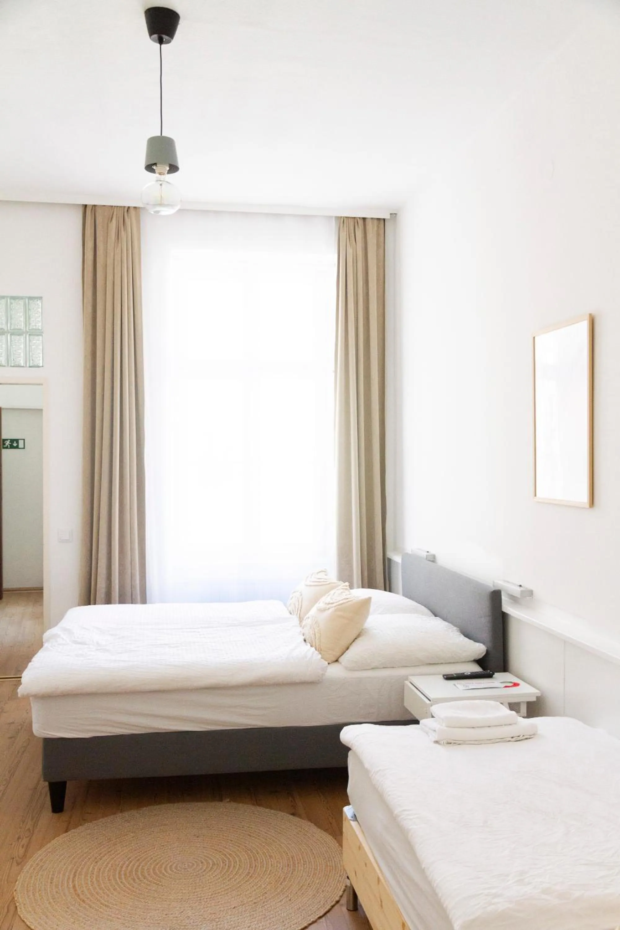 Bed in KIBI Rooms self check-in