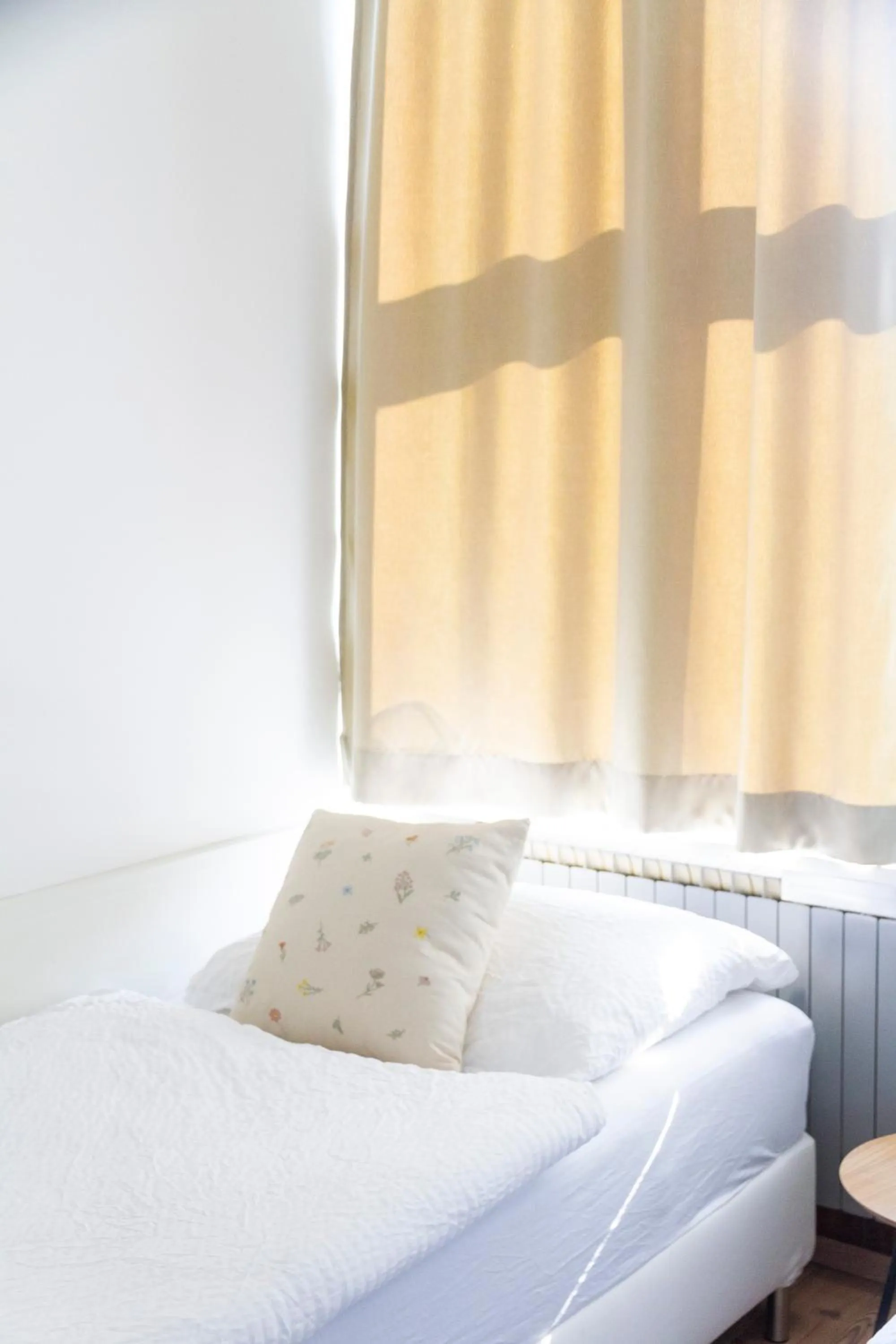 Bed in KIBI Rooms self check-in