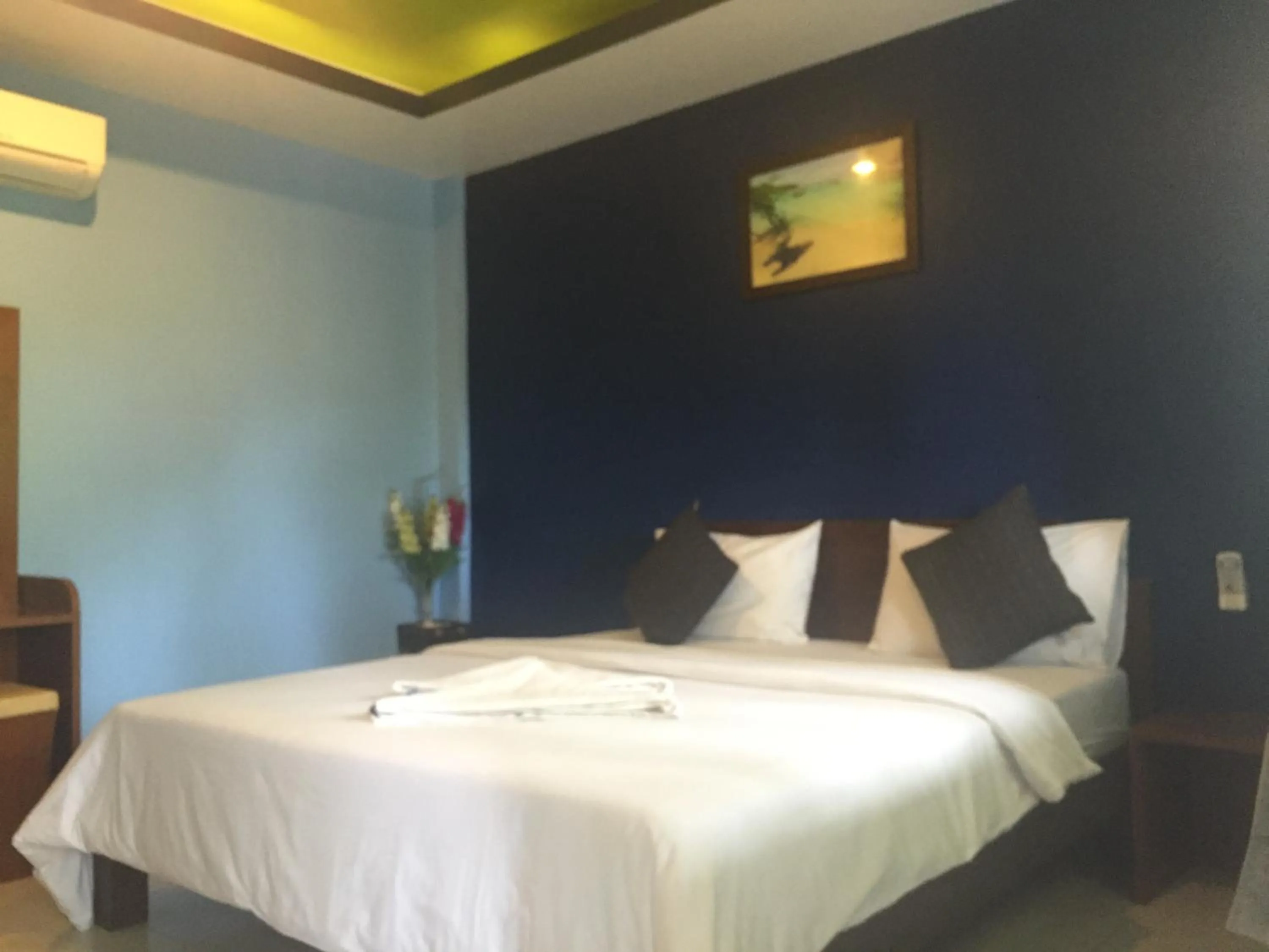 Bed in Baan Suan Ta Hotel