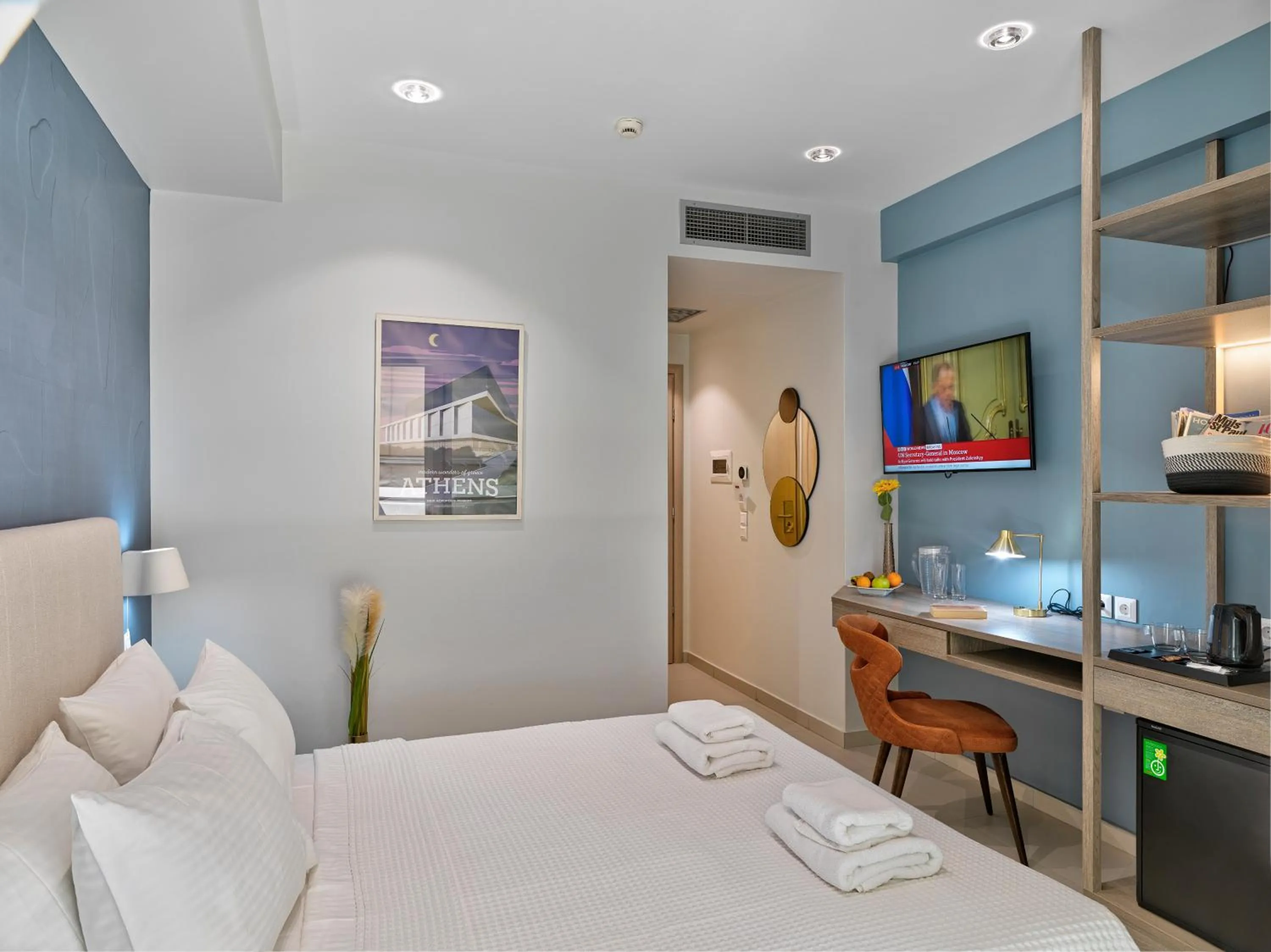 Bed in Phidias Piraeus Hotel