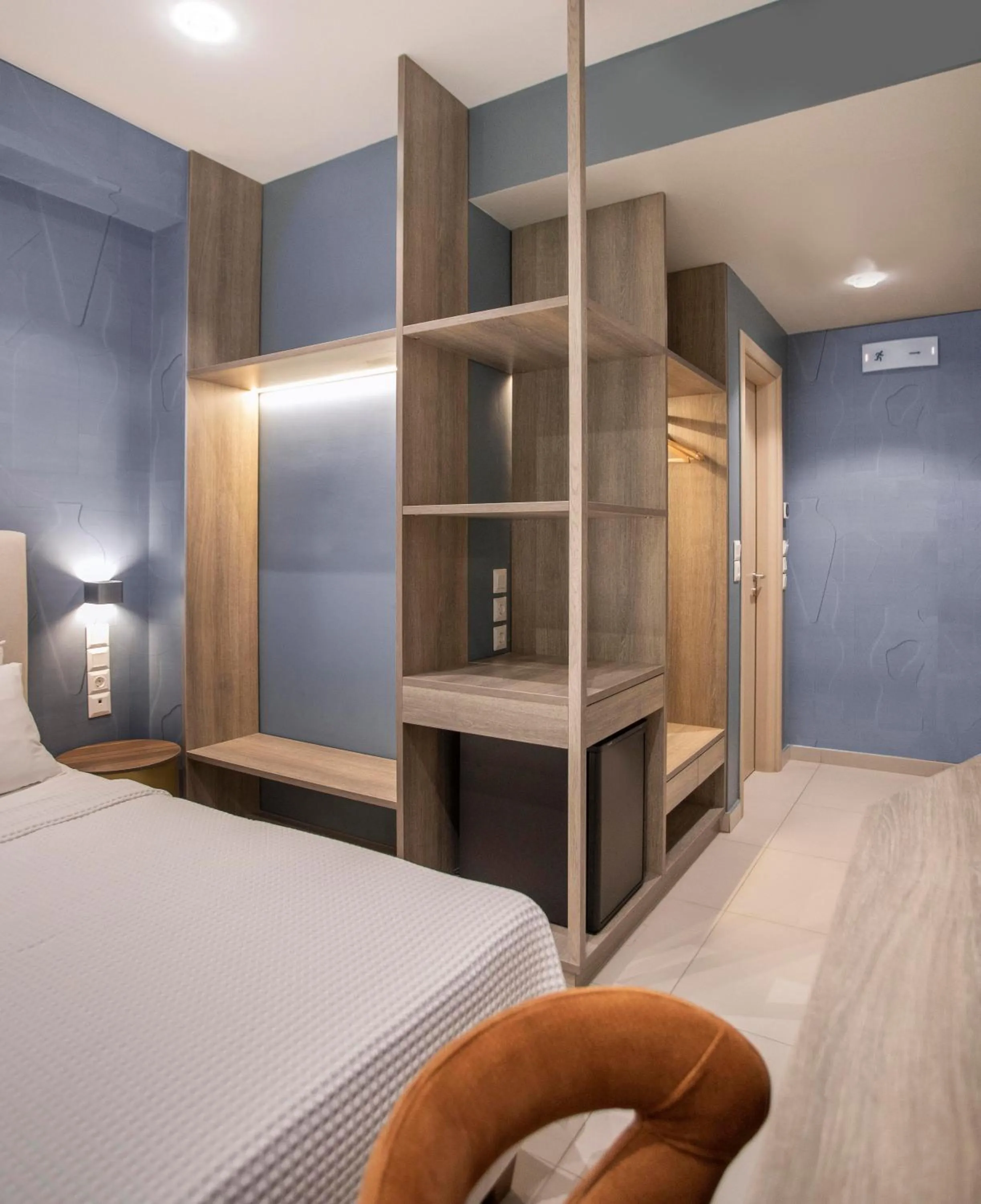 Bed in Phidias Piraeus Hotel