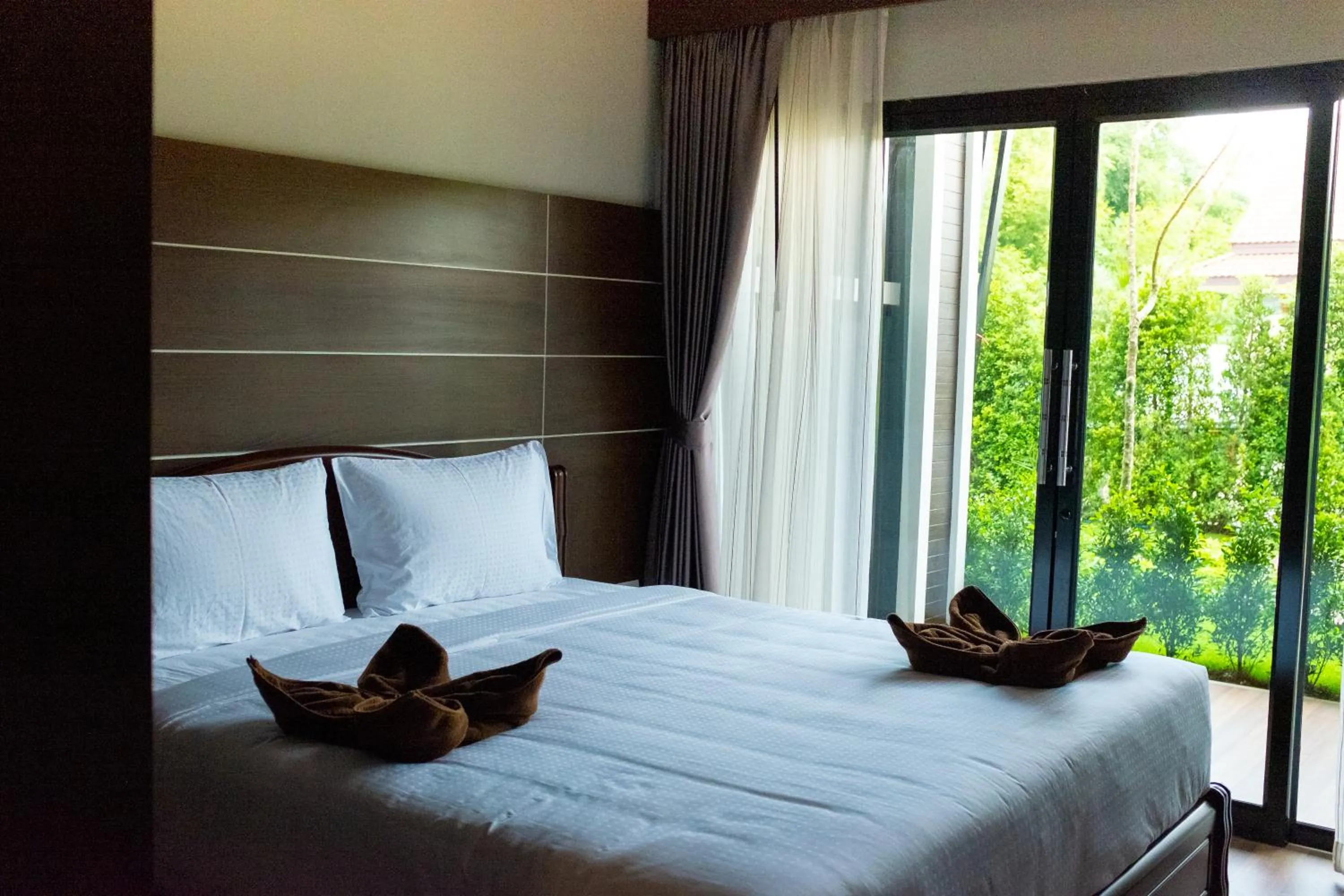 Bed in Oscar Villa Aonang Krabi