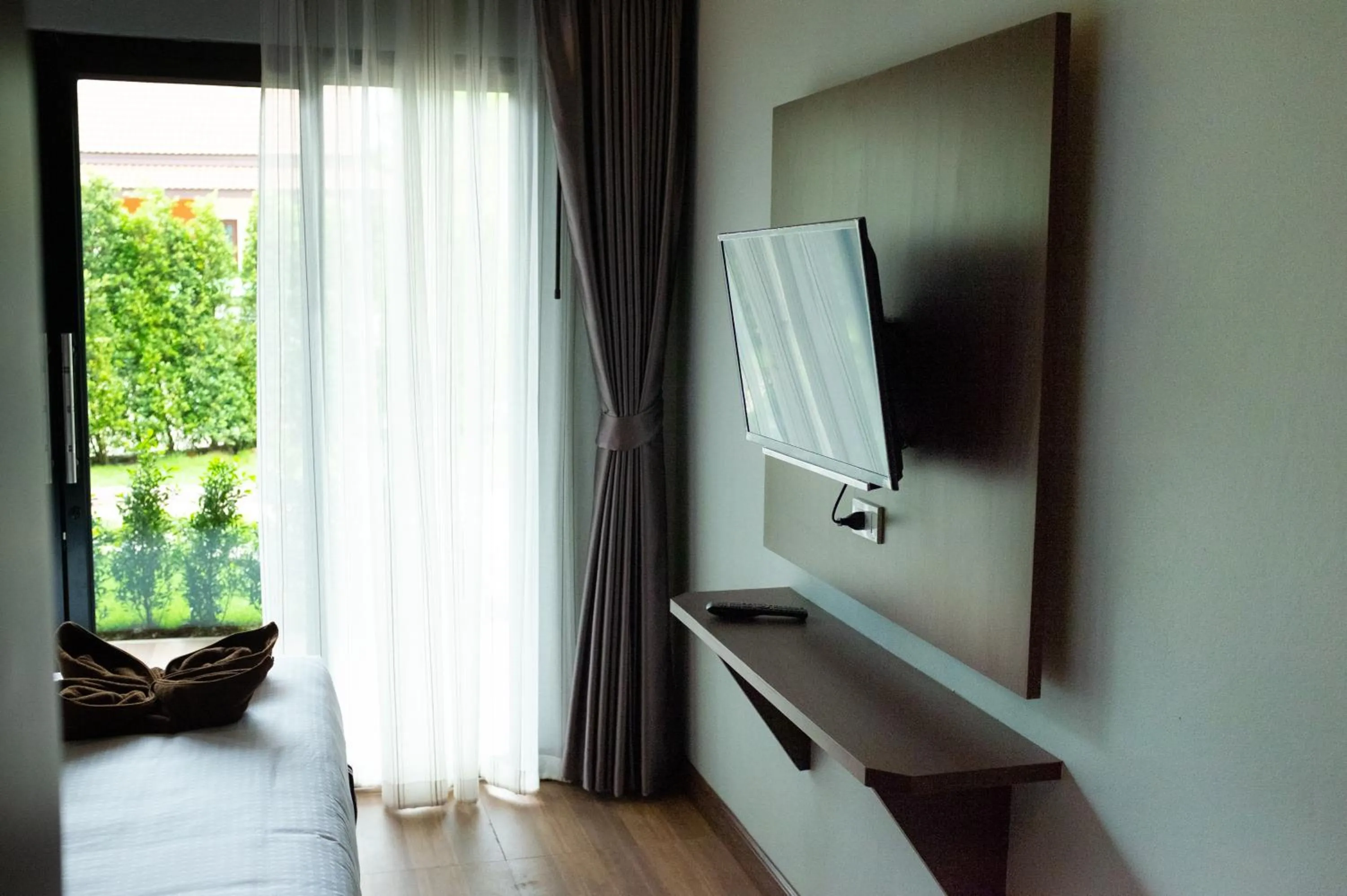 Communal lounge/ TV room in Oscar Villa Aonang Krabi