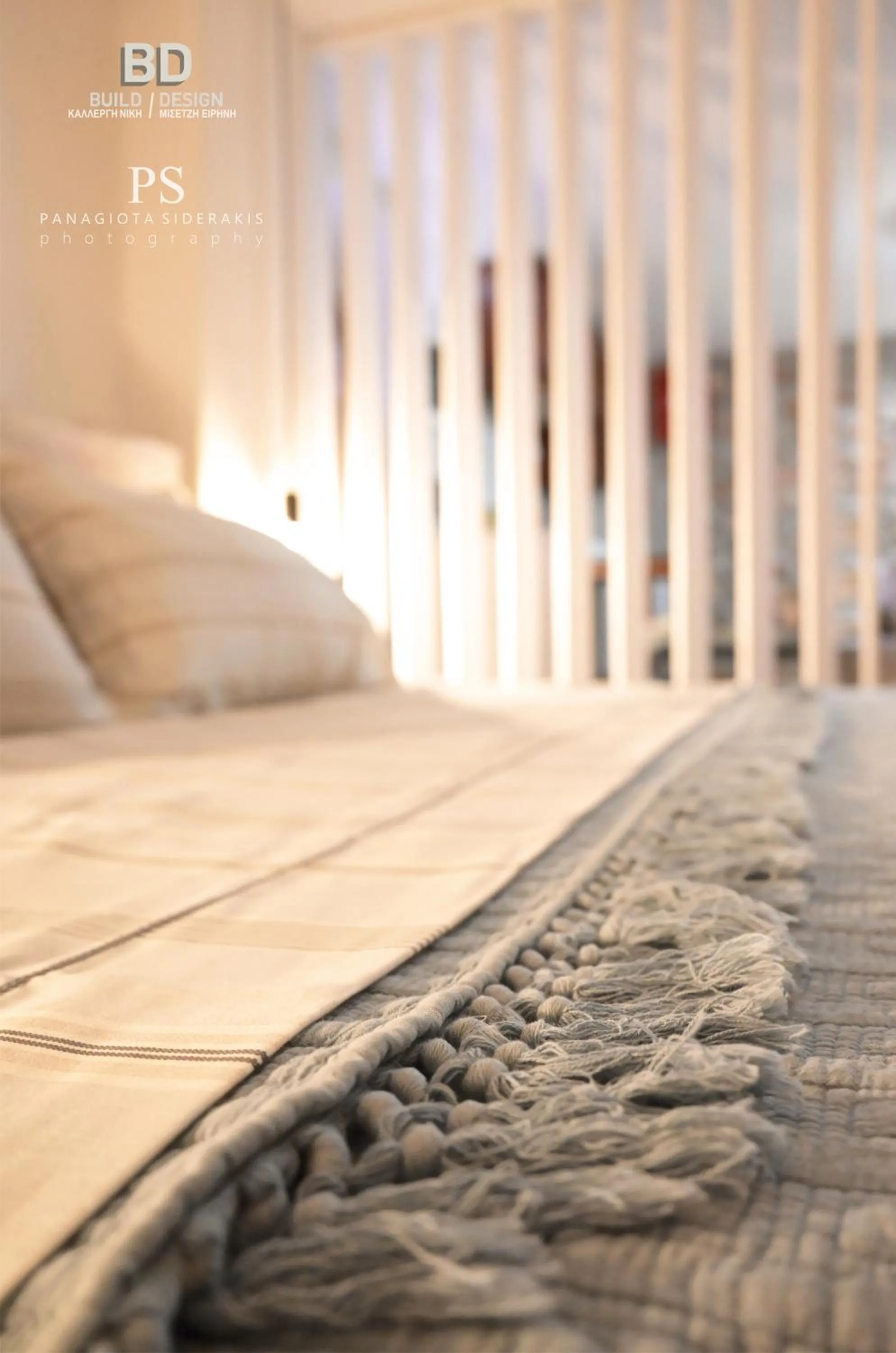 Bed in Pyrgos Houses and Restaurant