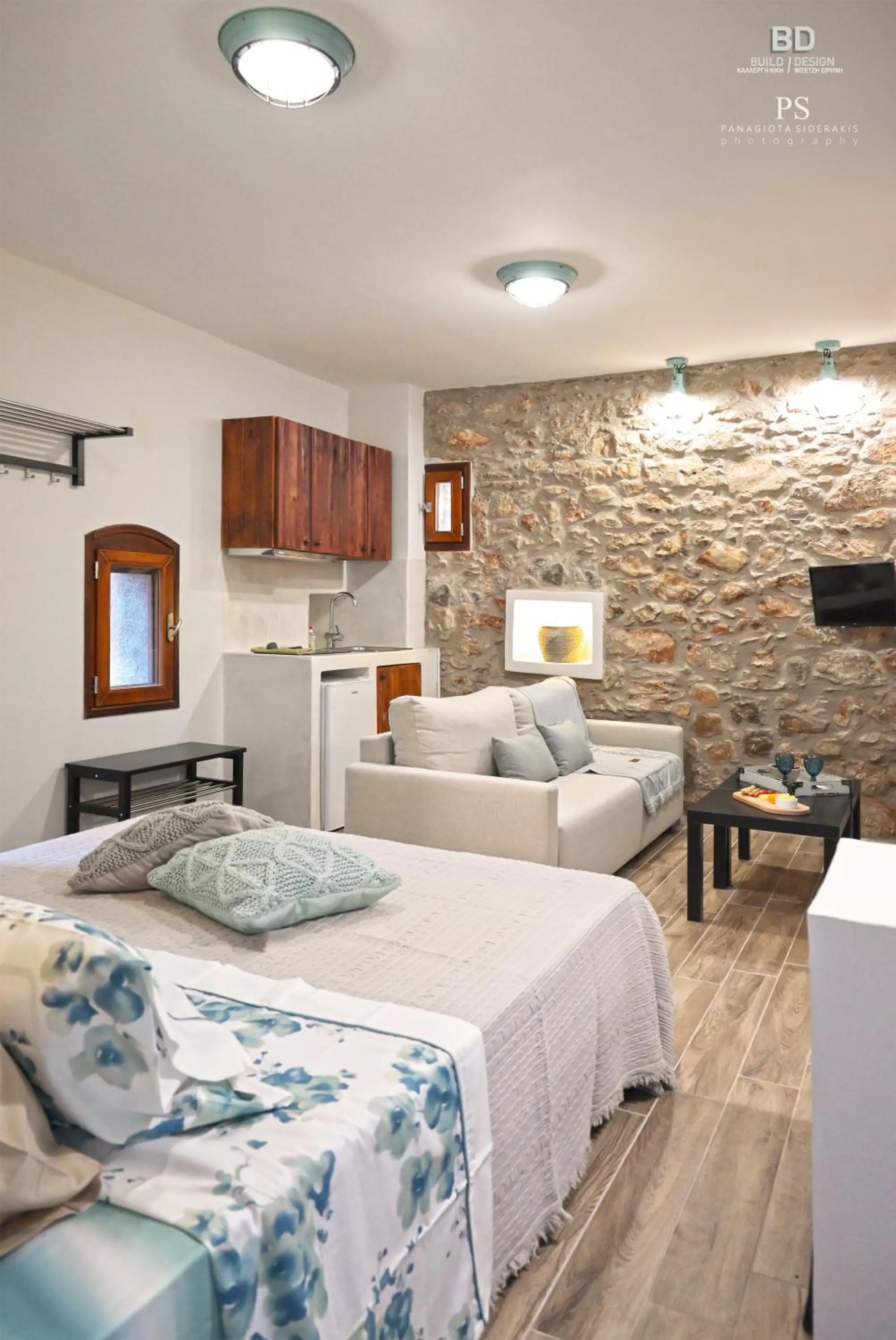 Bed in Pyrgos Houses and Restaurant