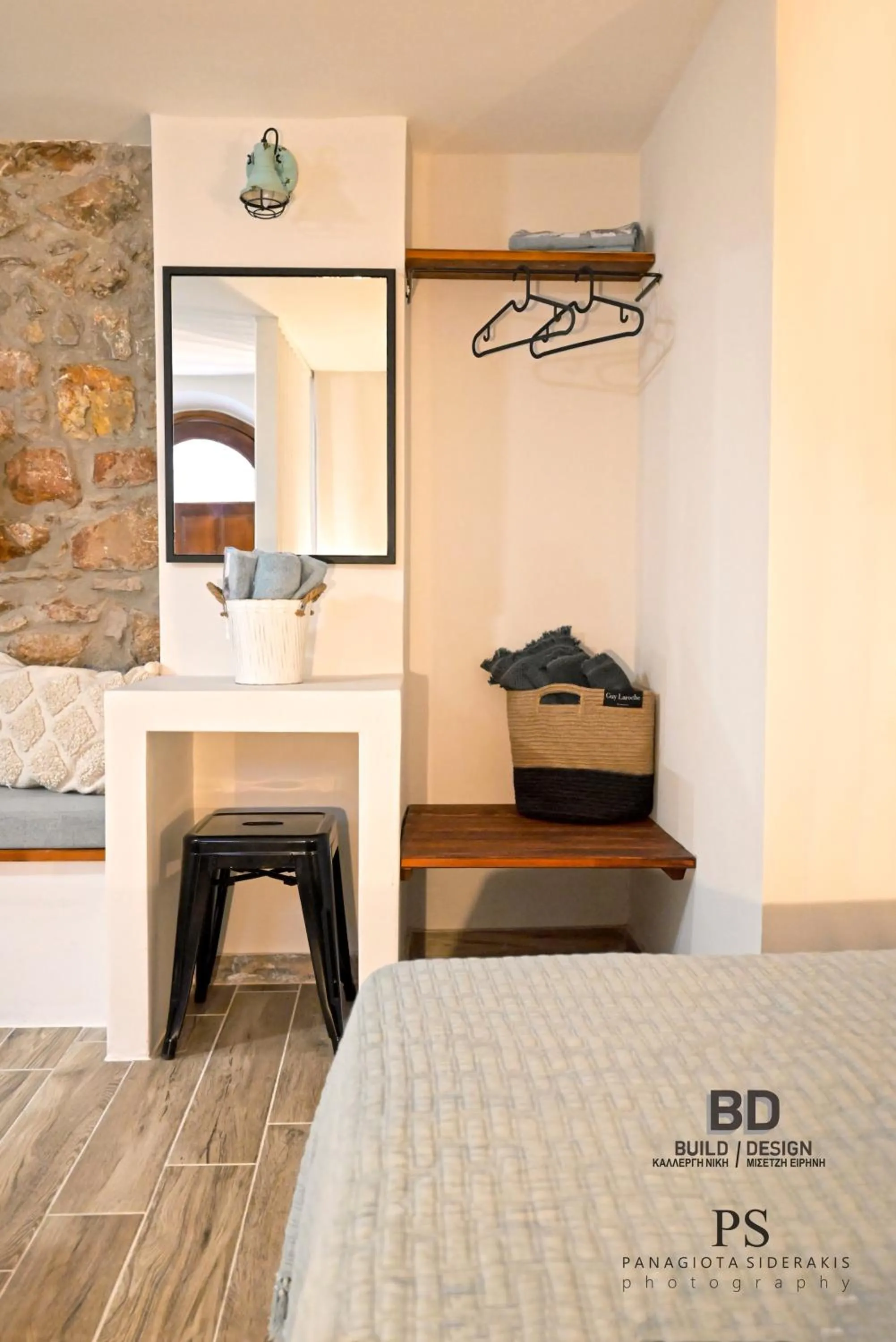 Bed in Pyrgos Houses and Restaurant