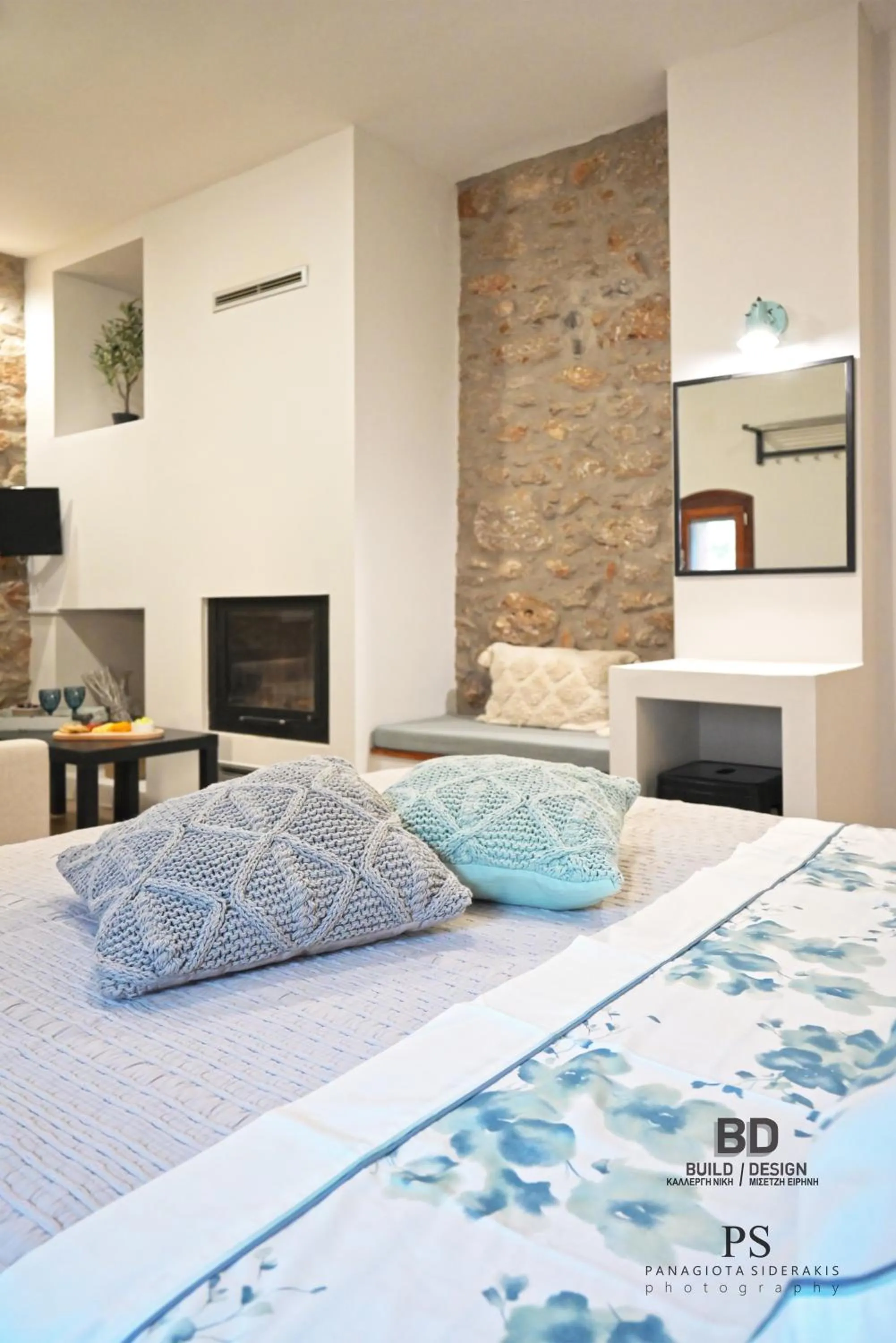 Bed in Pyrgos Houses and Restaurant