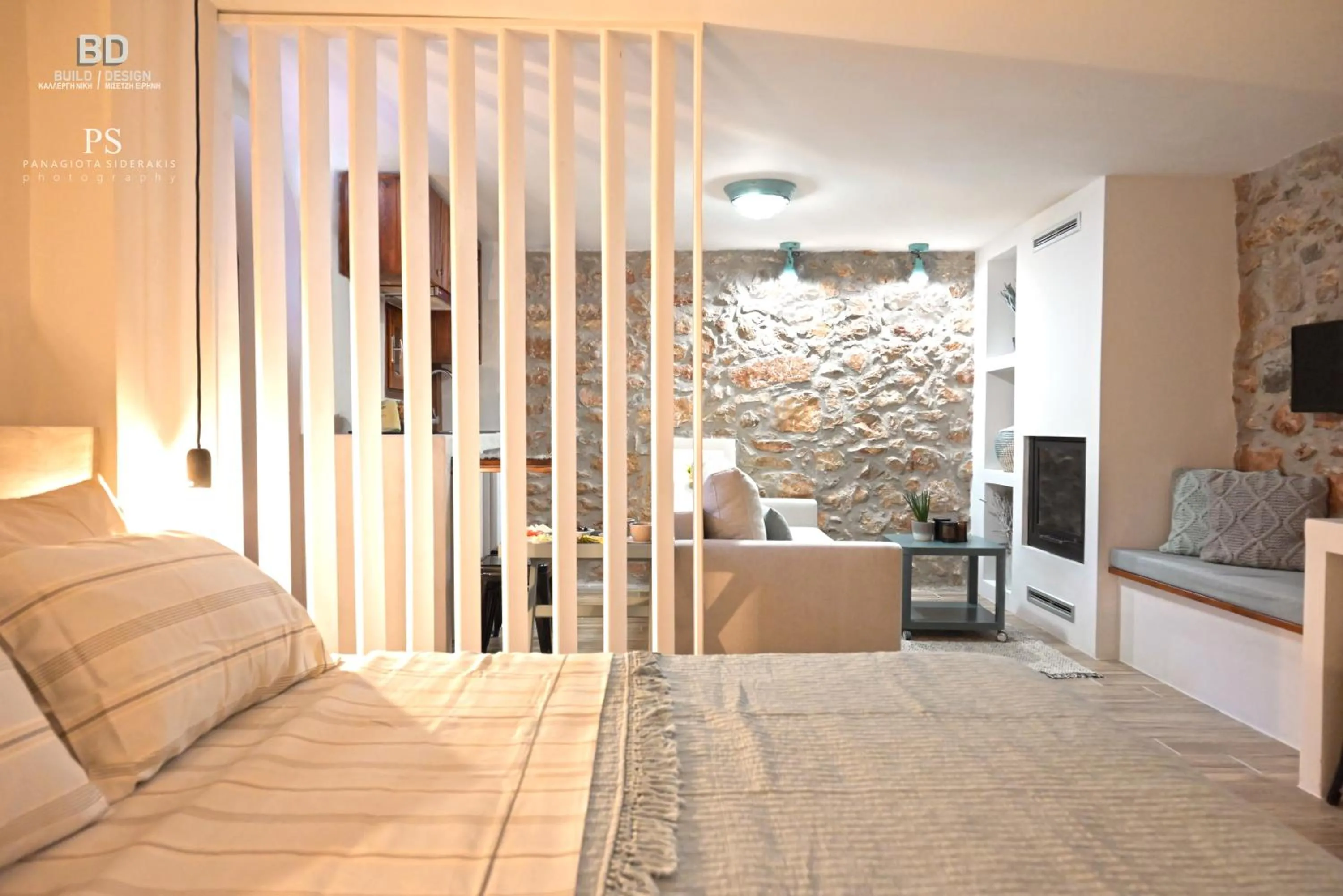 Bed in Pyrgos Houses and Restaurant