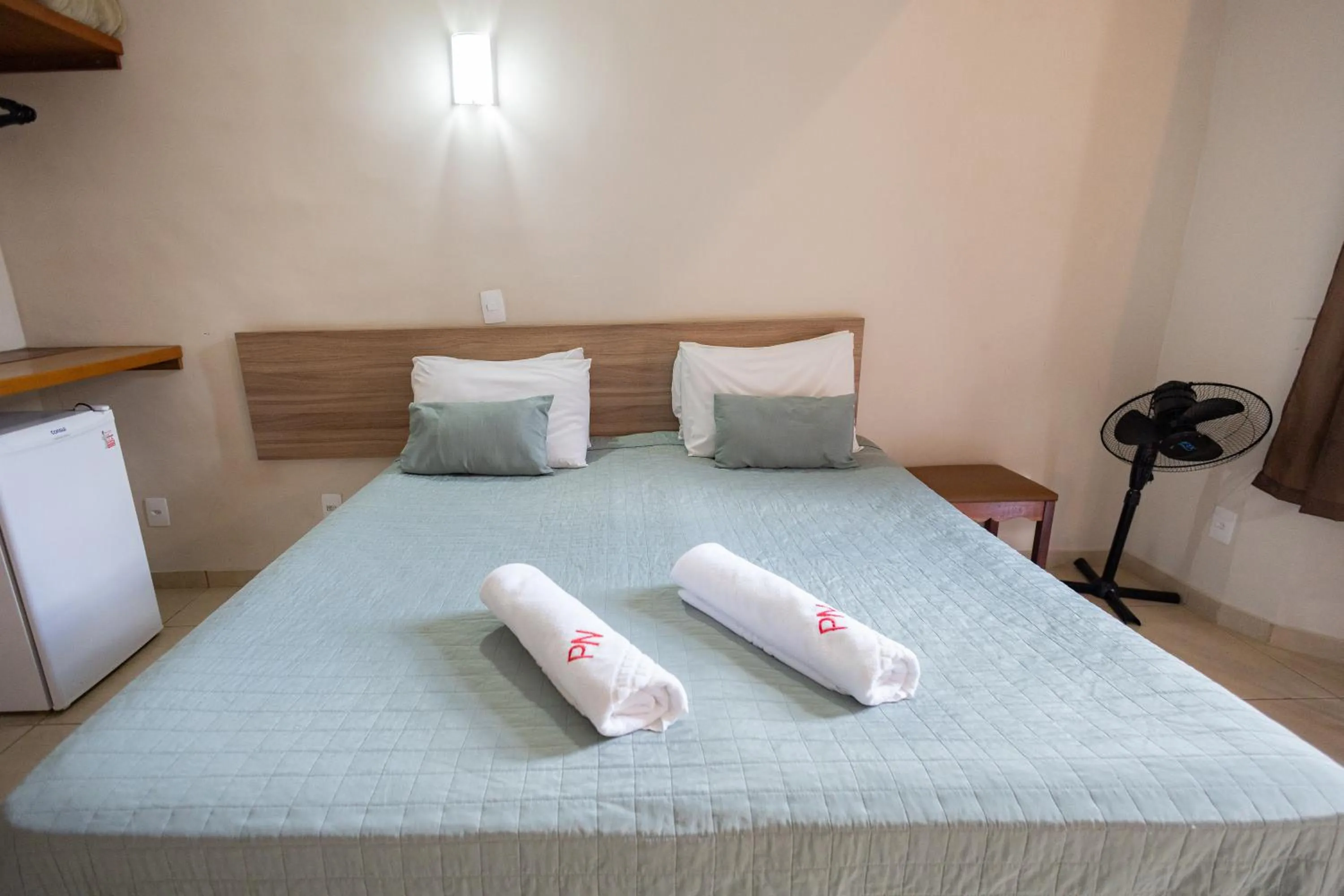 Bed in Pousada Nefelibatas