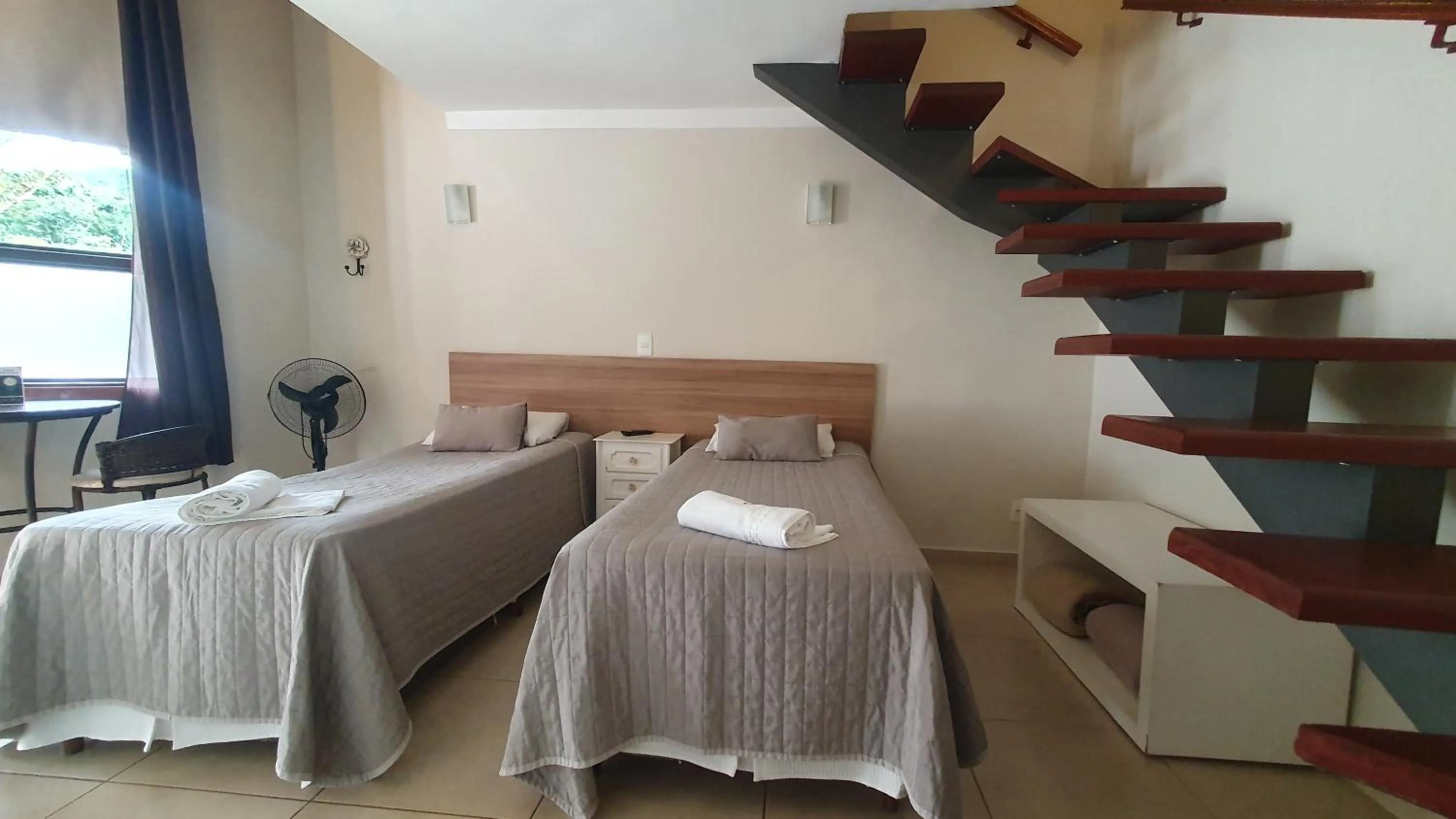 Photo of the whole room, Bed in Pousada Nefelibatas