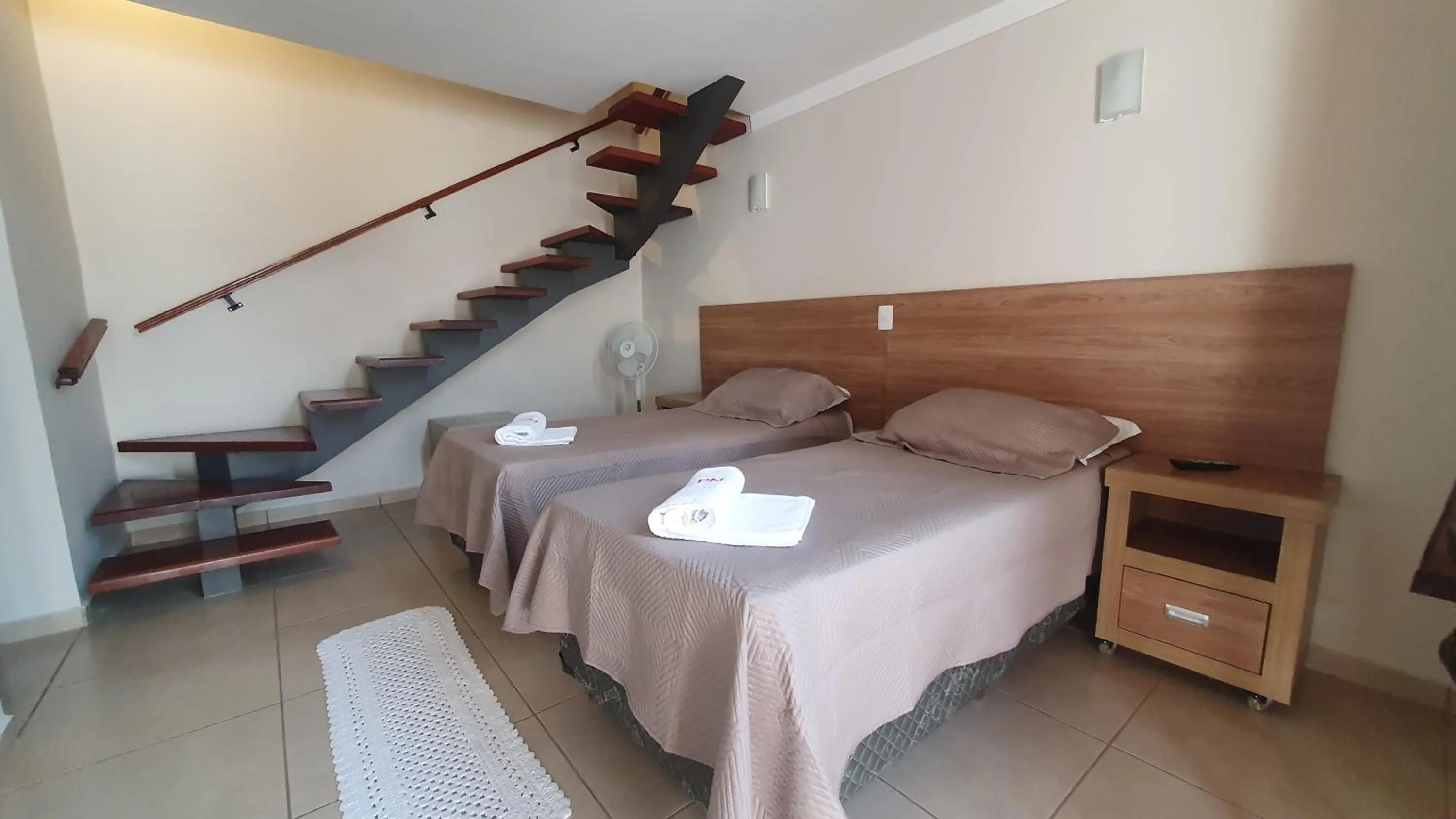 Bed in Pousada Nefelibatas