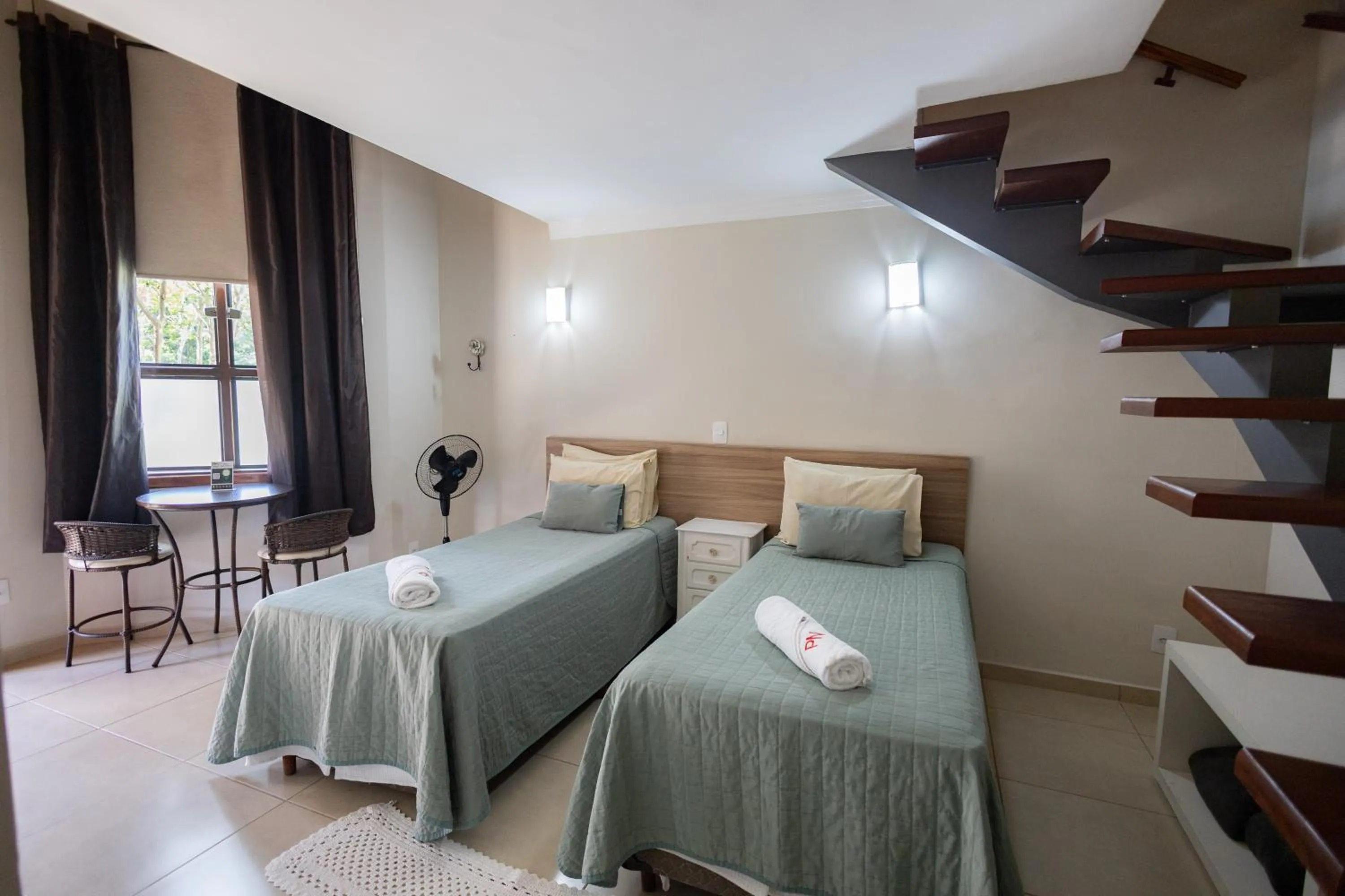 Bed in Pousada Nefelibatas