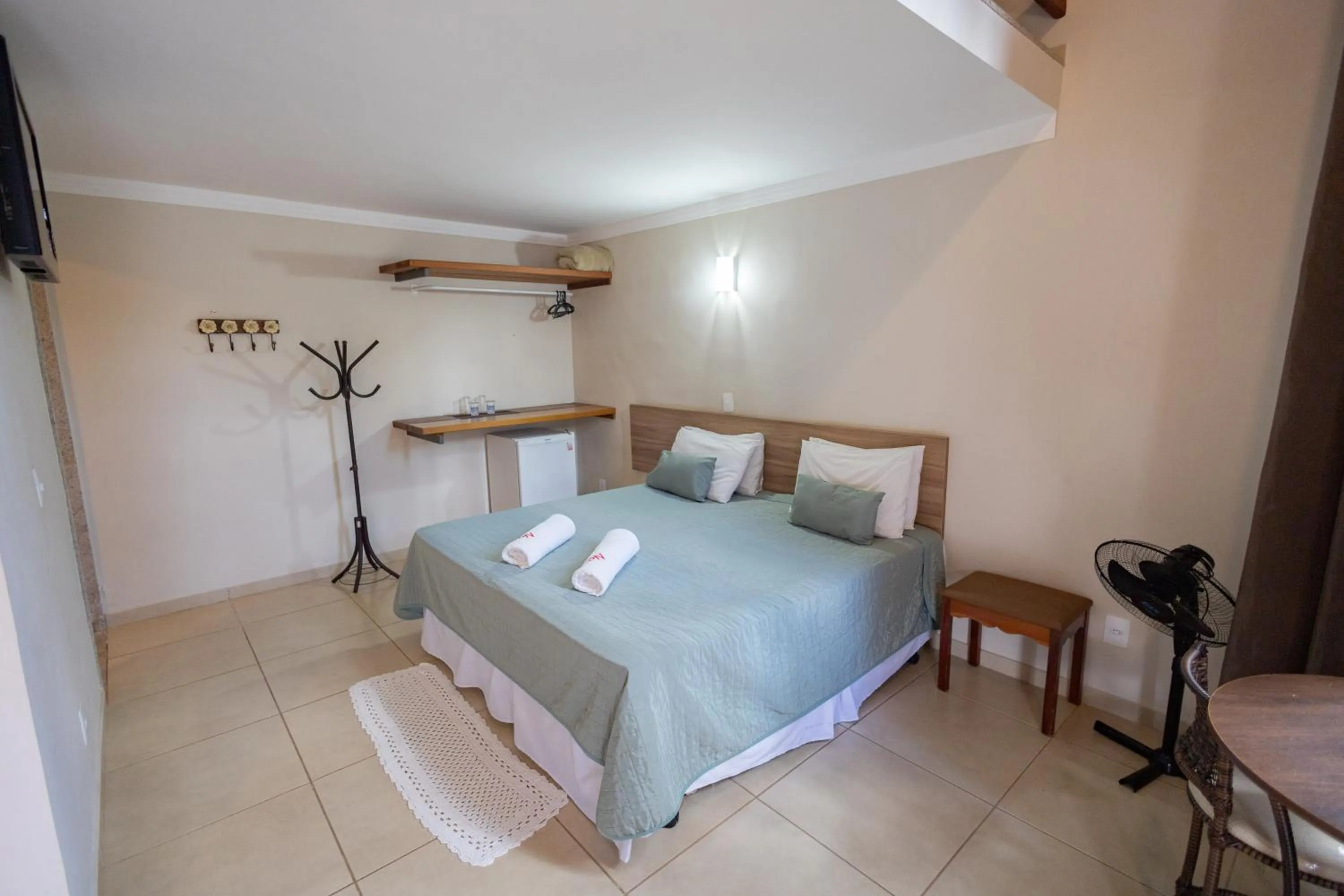 Bed in Pousada Nefelibatas