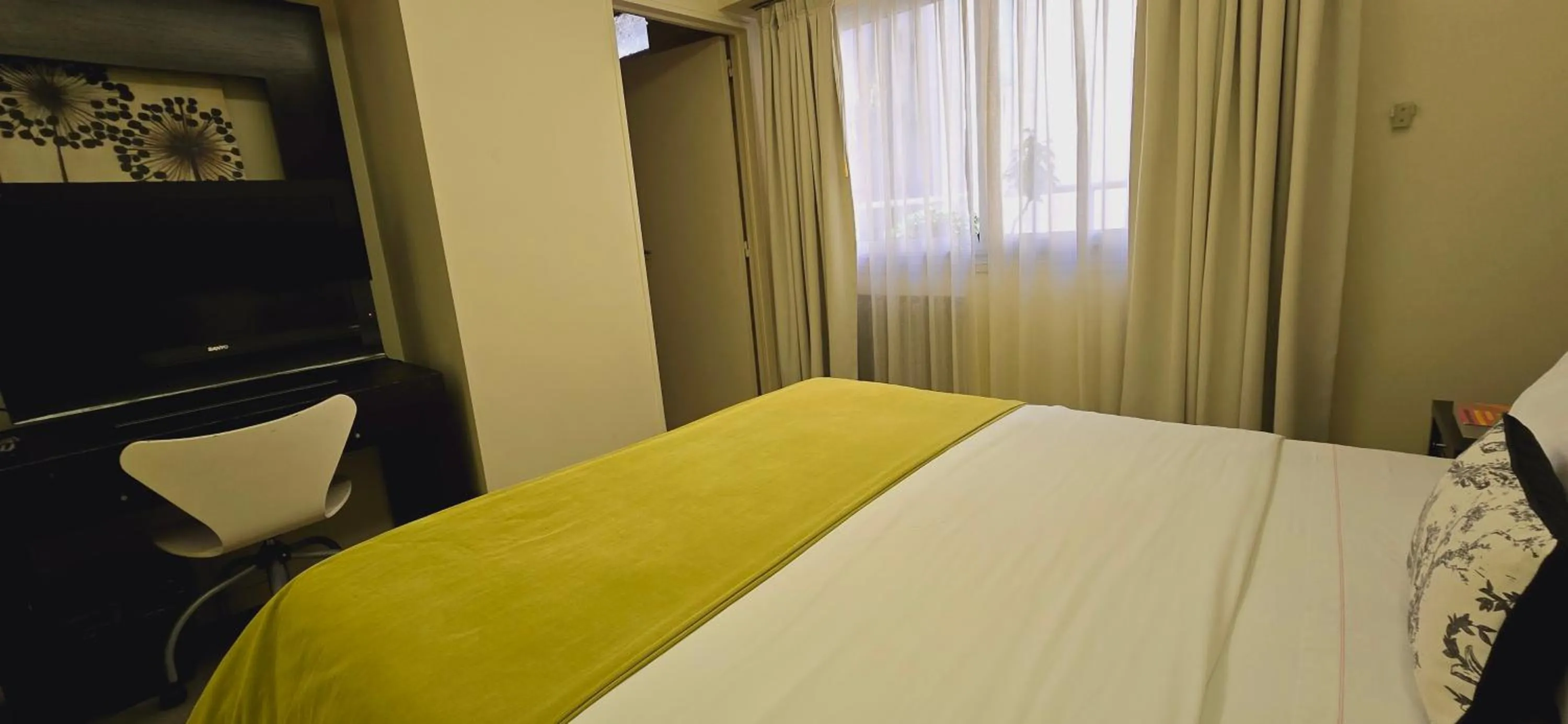 Bed in Ulises Recoleta Suites