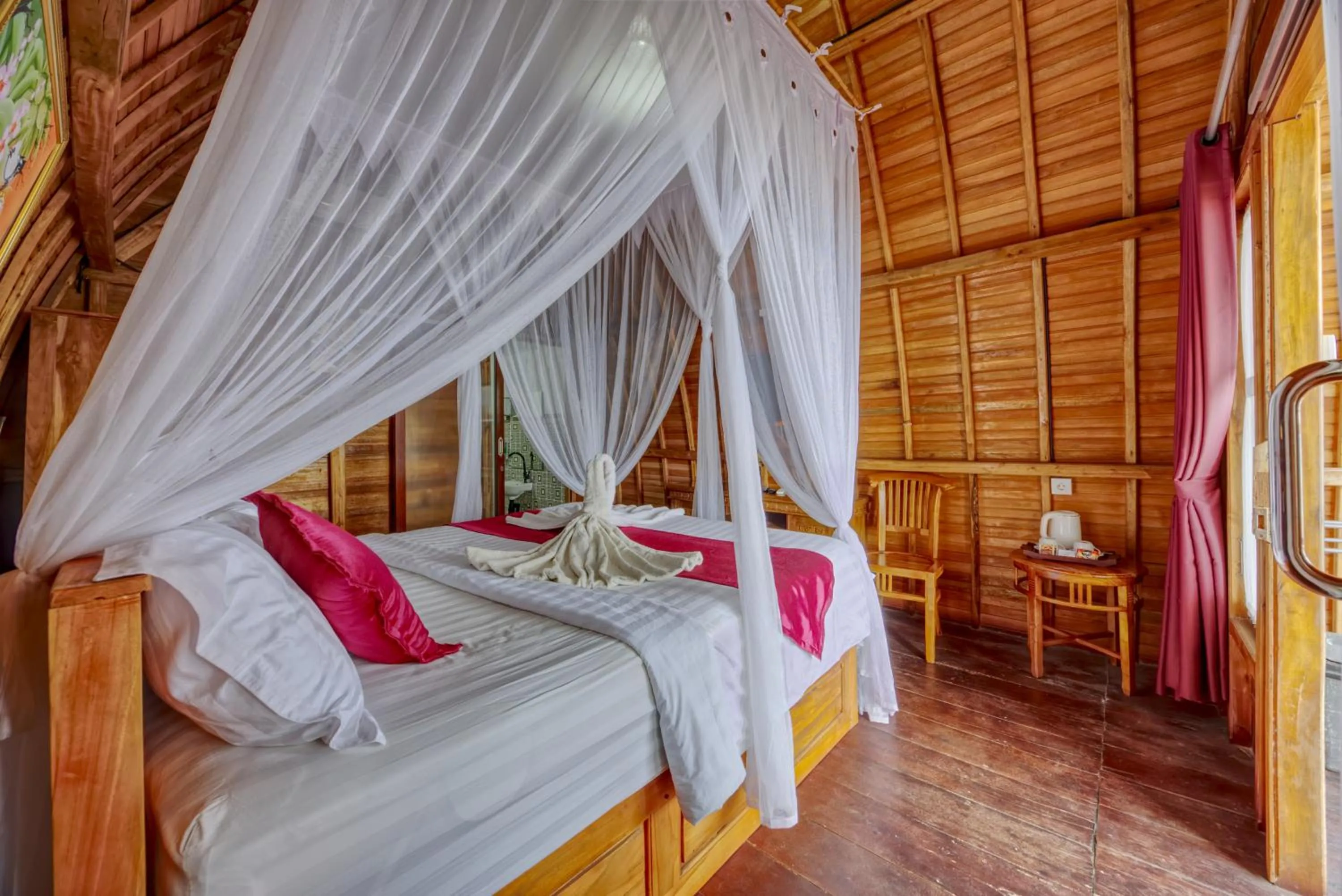 Bed in Santen Beach Bungalows