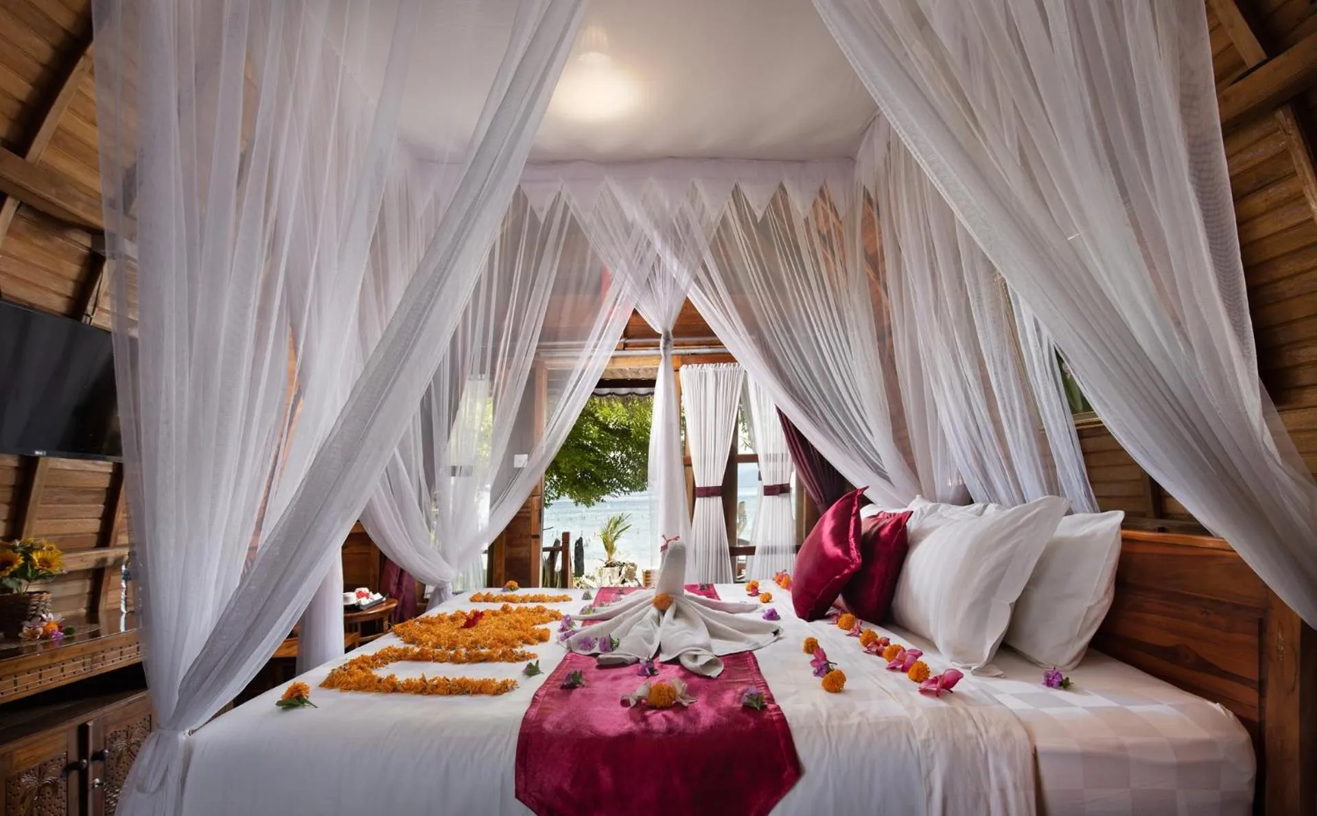 Bed in Santen Beach Bungalows