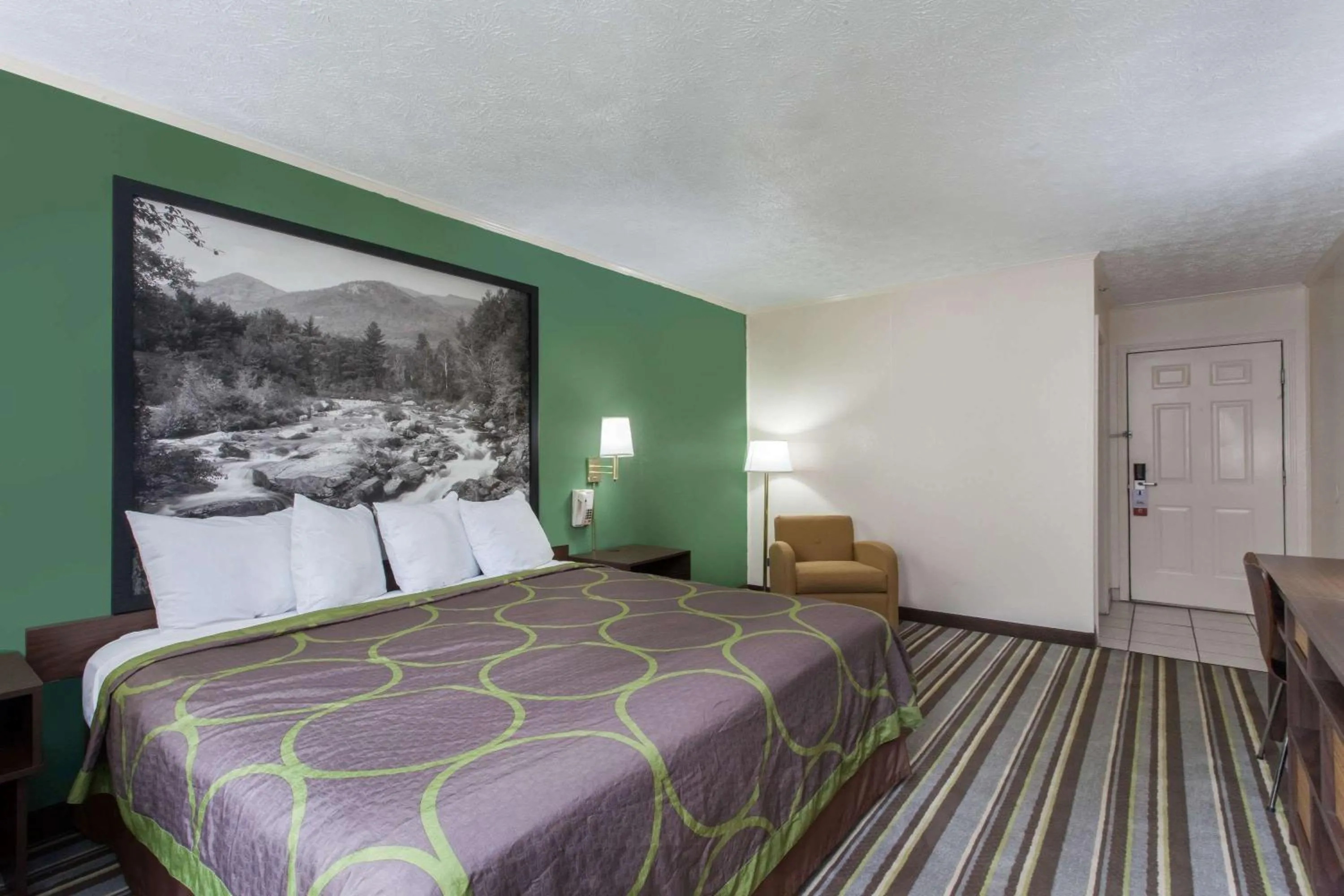 On site, Bed in Executive East Syracuse Hotel