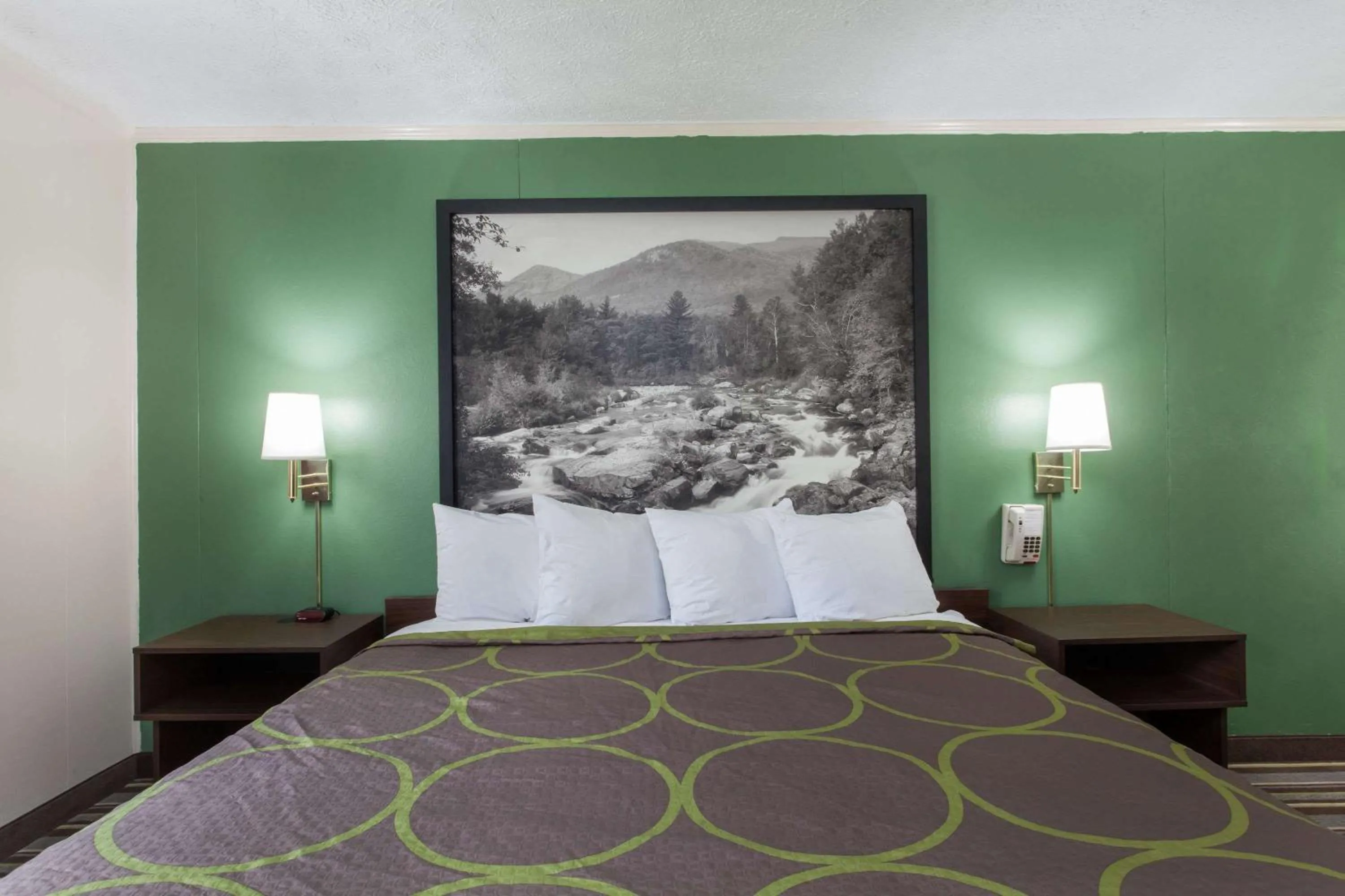 On site, Bed in Executive East Syracuse Hotel